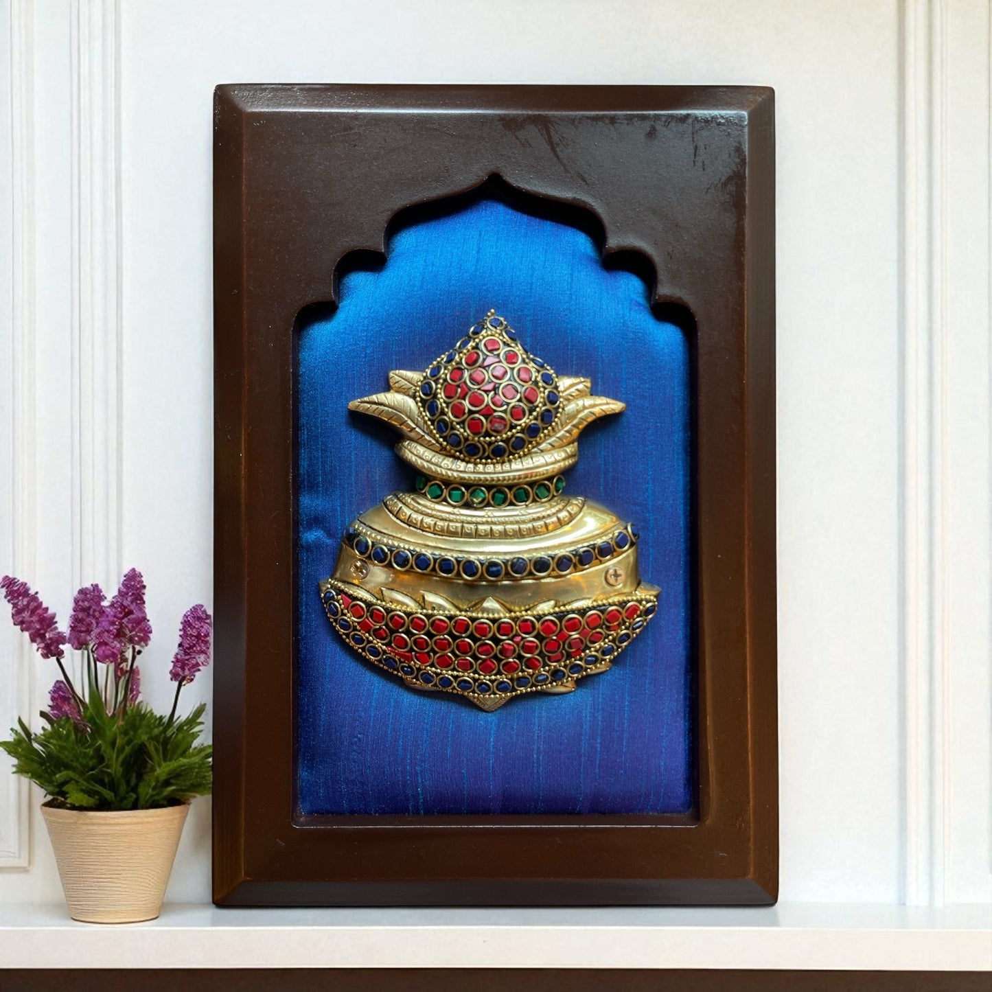 Brass kuber kalash with stone work on Blue silk in wooden frame
