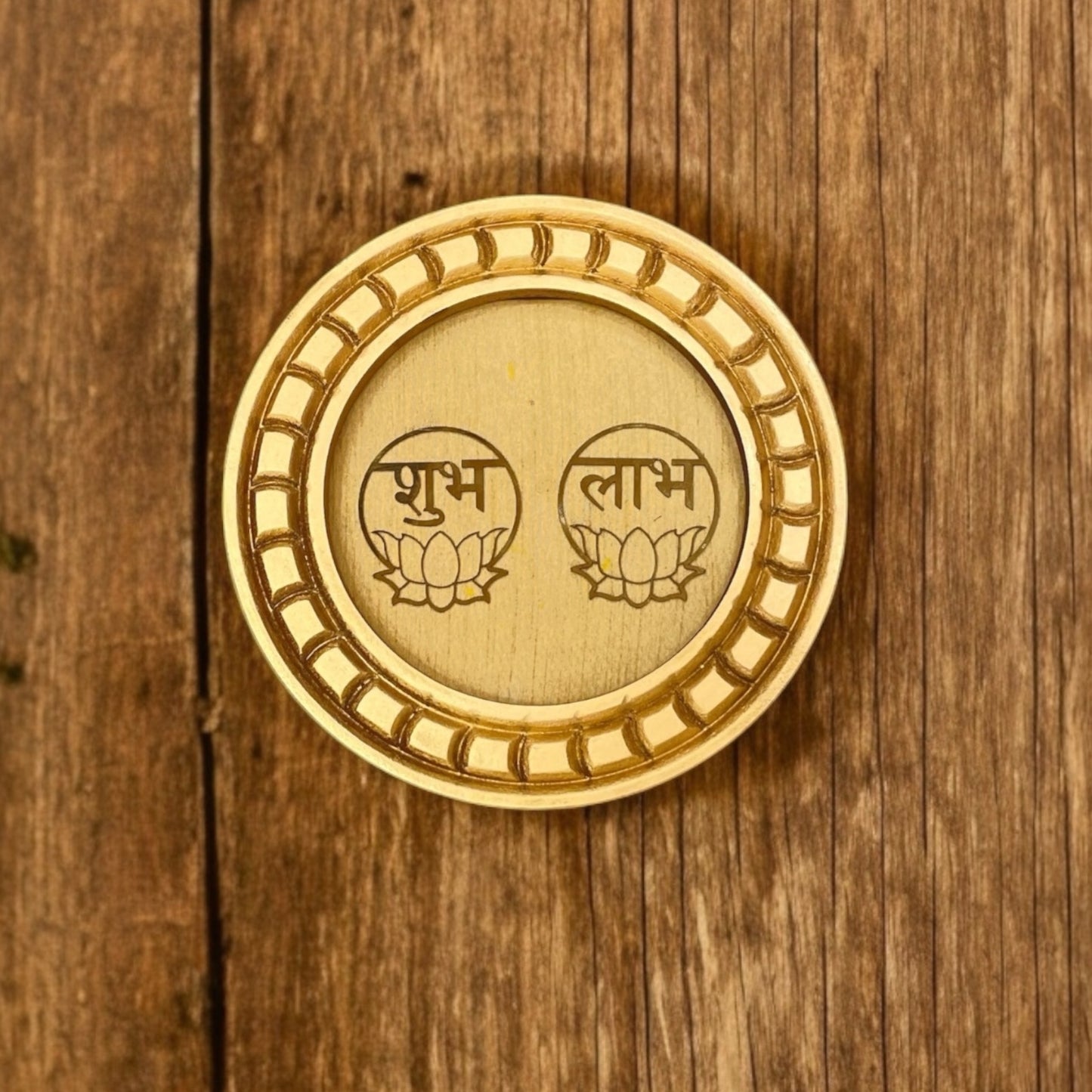 Shubh Labh Golden circular frame with beige backdrop