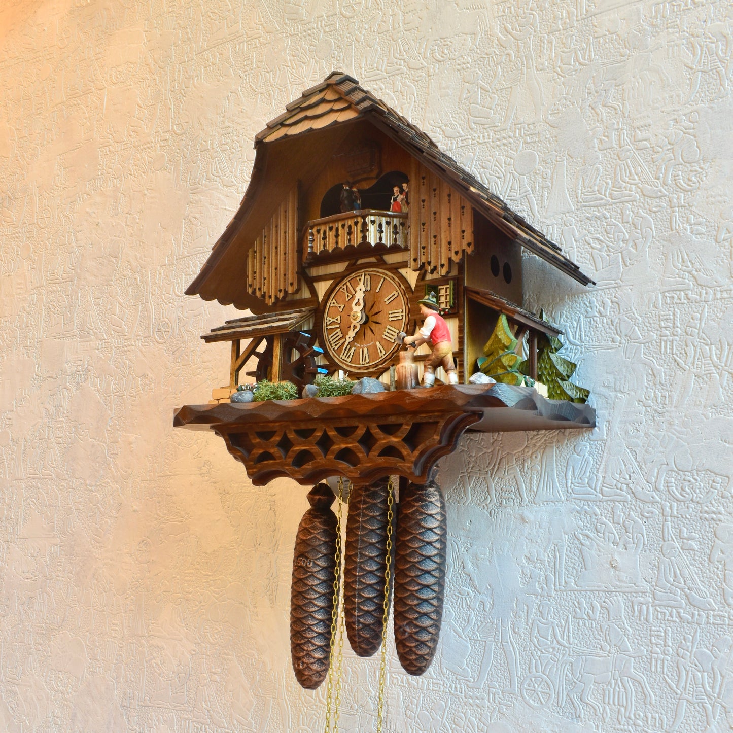 Musical mechanical cuckoo clock - with wood cutter and German farm dance moving parts - 8 day movement