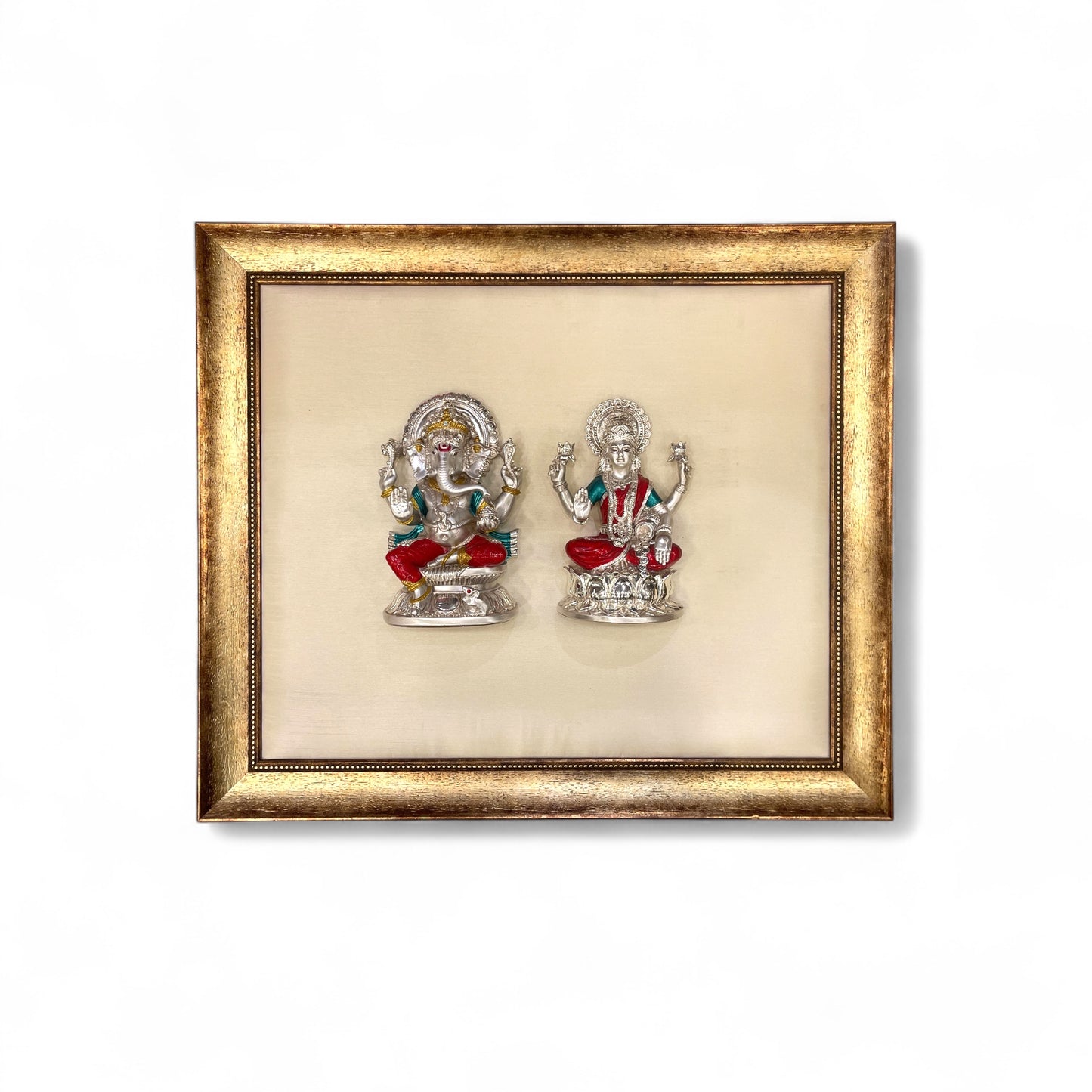 Ganesh Laxmi Silver on White Silk Backdrop in Antique Gold Moulded Frame