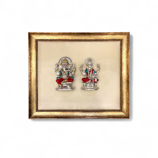 Ganesh Laxmi Silver on White Silk Backdrop in Antique Gold Moulded Frame