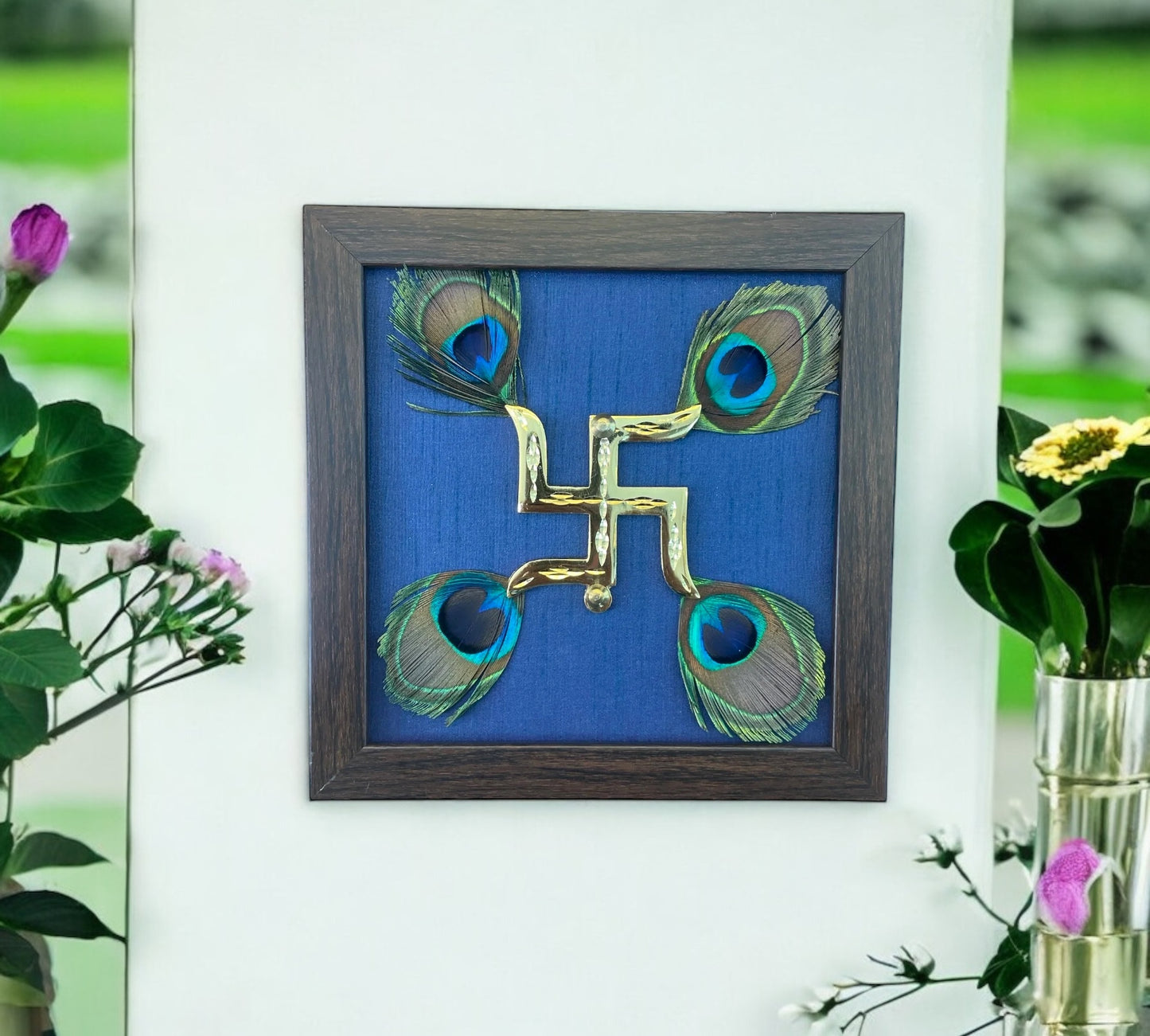 Brass Swastik with Peacock Feather and Blue silk in brown Frame