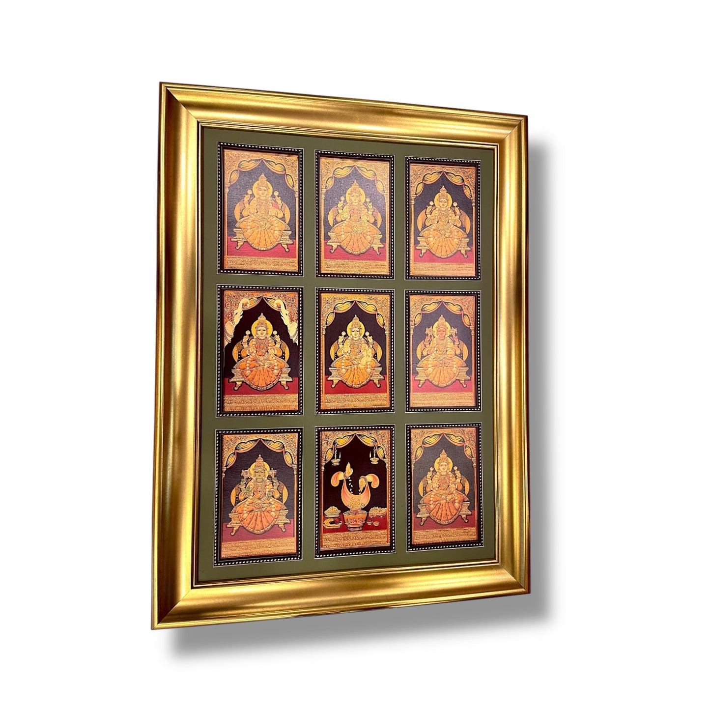 Astalakshmi gold foil artwork in a molded frame.