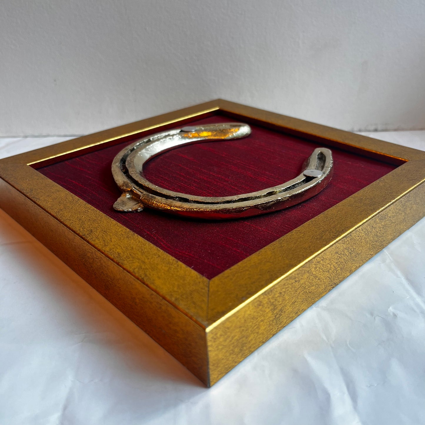 Good Luck Brass Horse Shoe with wine red silk background