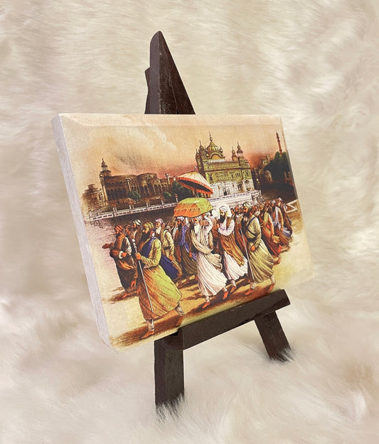 Granth Saheb Ji installed in the Golden Temple on Sandstone with Wooden stand