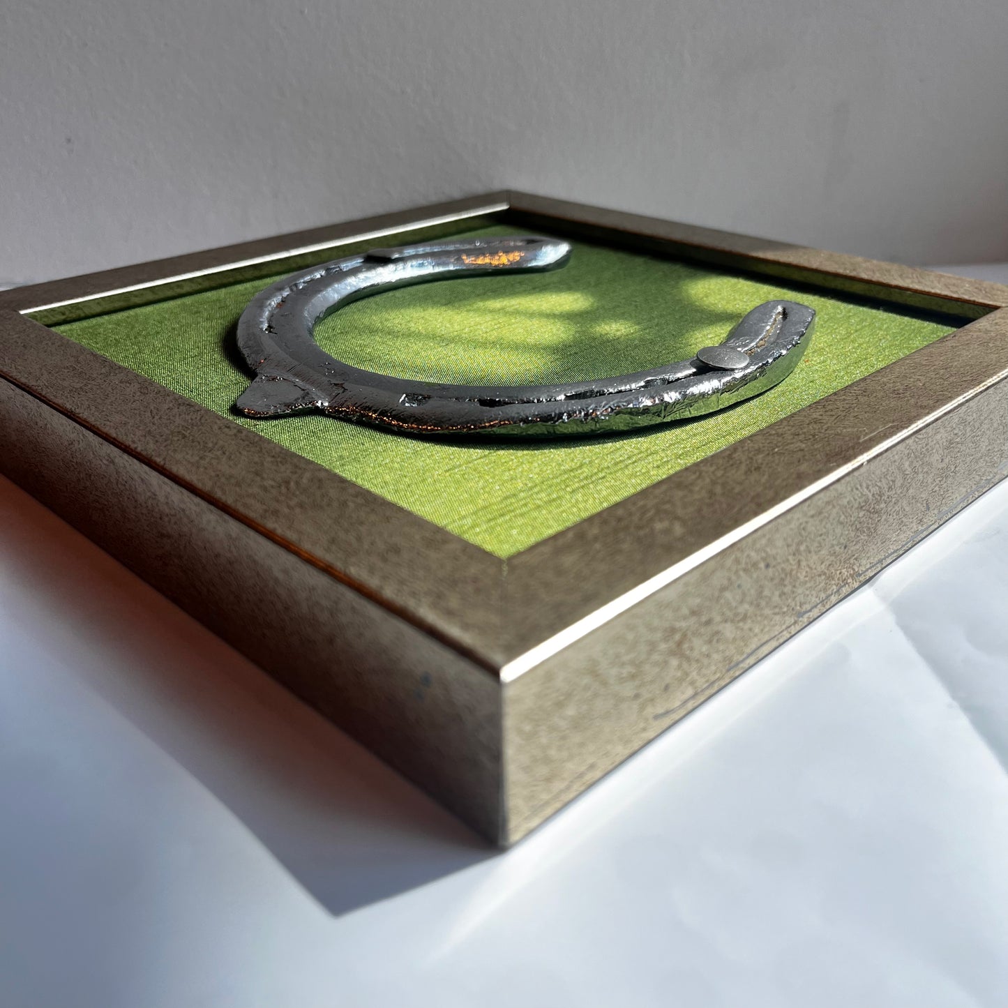 Good Luck Horse Shoe with Green silk background