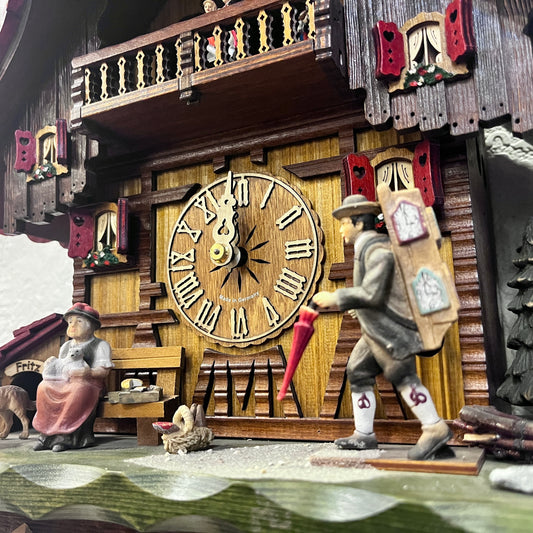 Musical 8 day mechanical cuckoo clock with clock seller and German farm dance movement
