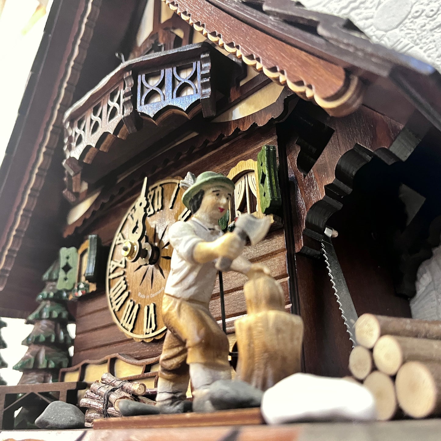 Mechanical original cuckoo clock with wood cutter with pine trees and dog miniature - 8 day Movement