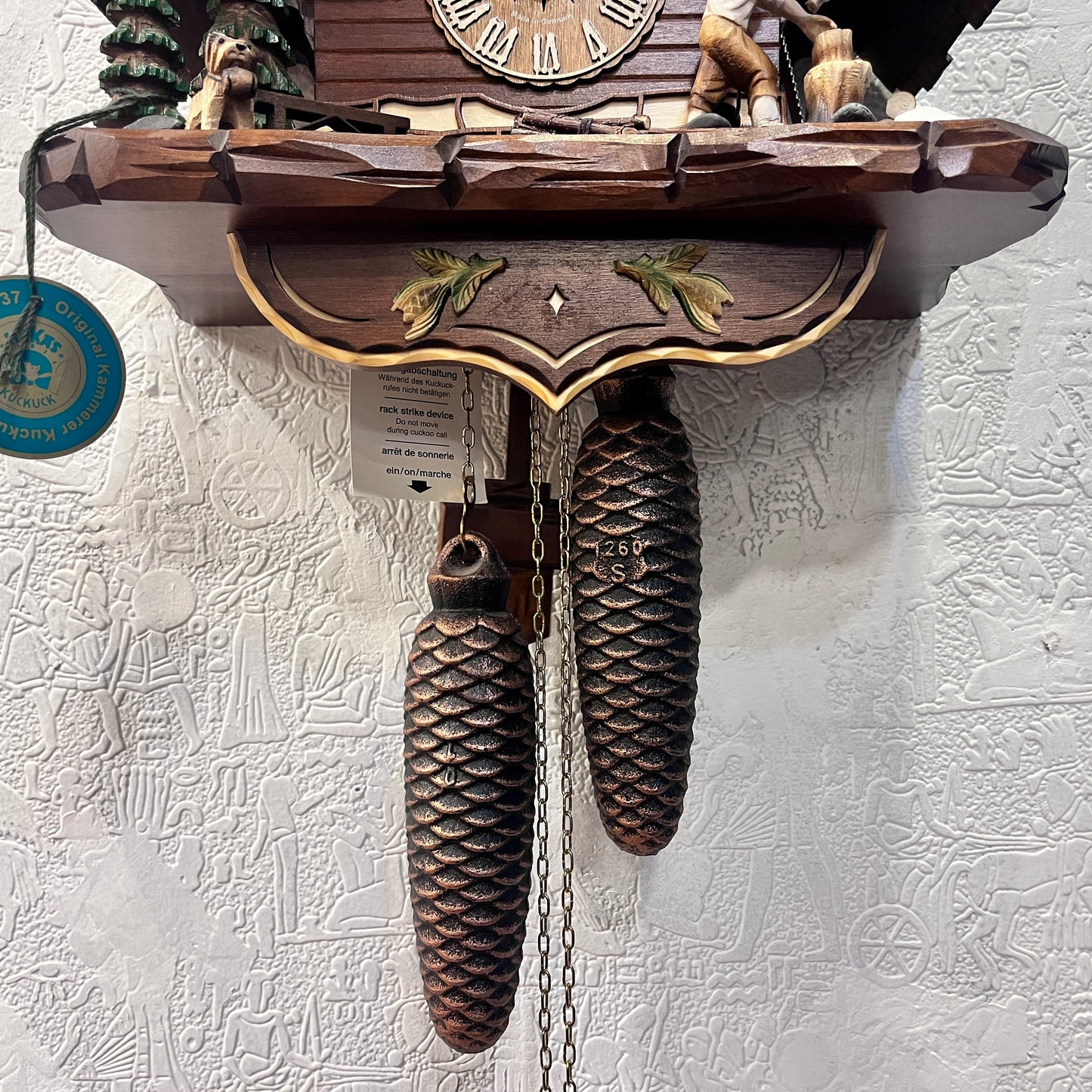 Mechanical original cuckoo clock with wood cutter with pine trees and dog miniature - 8 day Movement