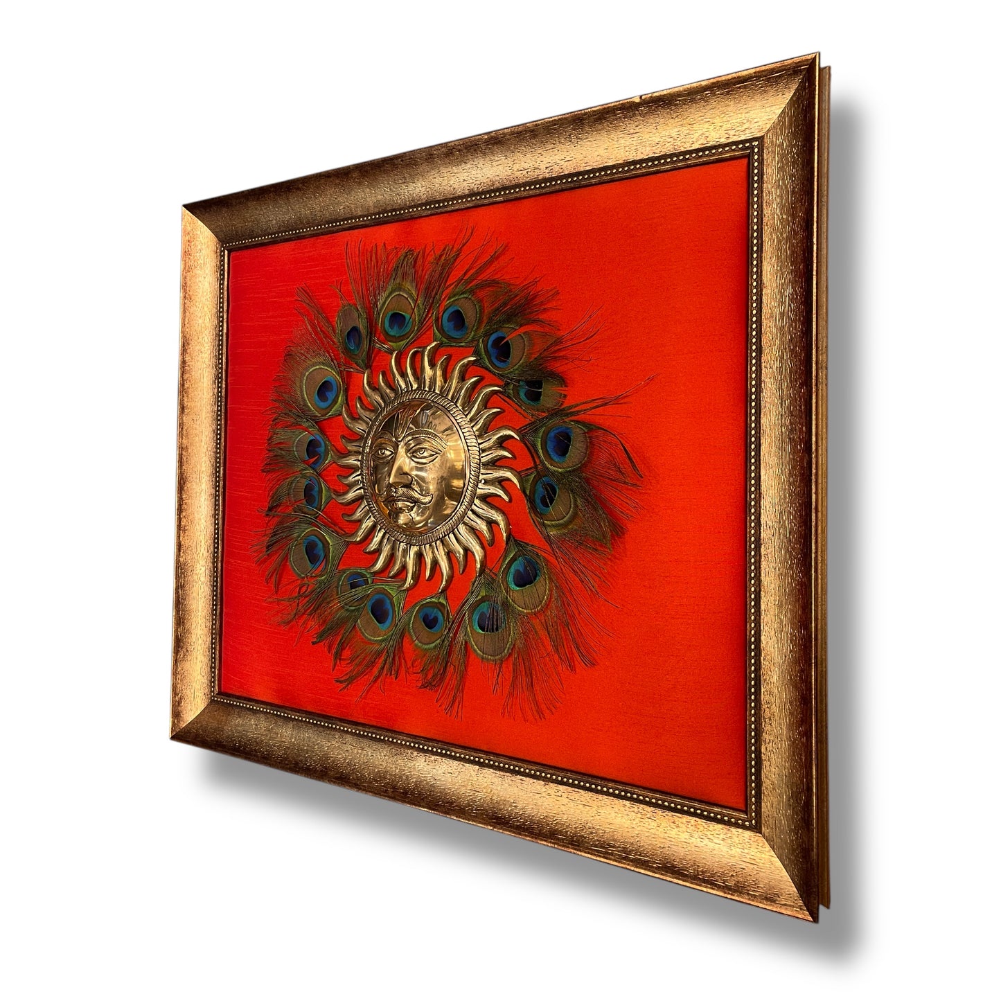 Brass Sun Wall Art with Peacock Feathers in Moulded Frame.