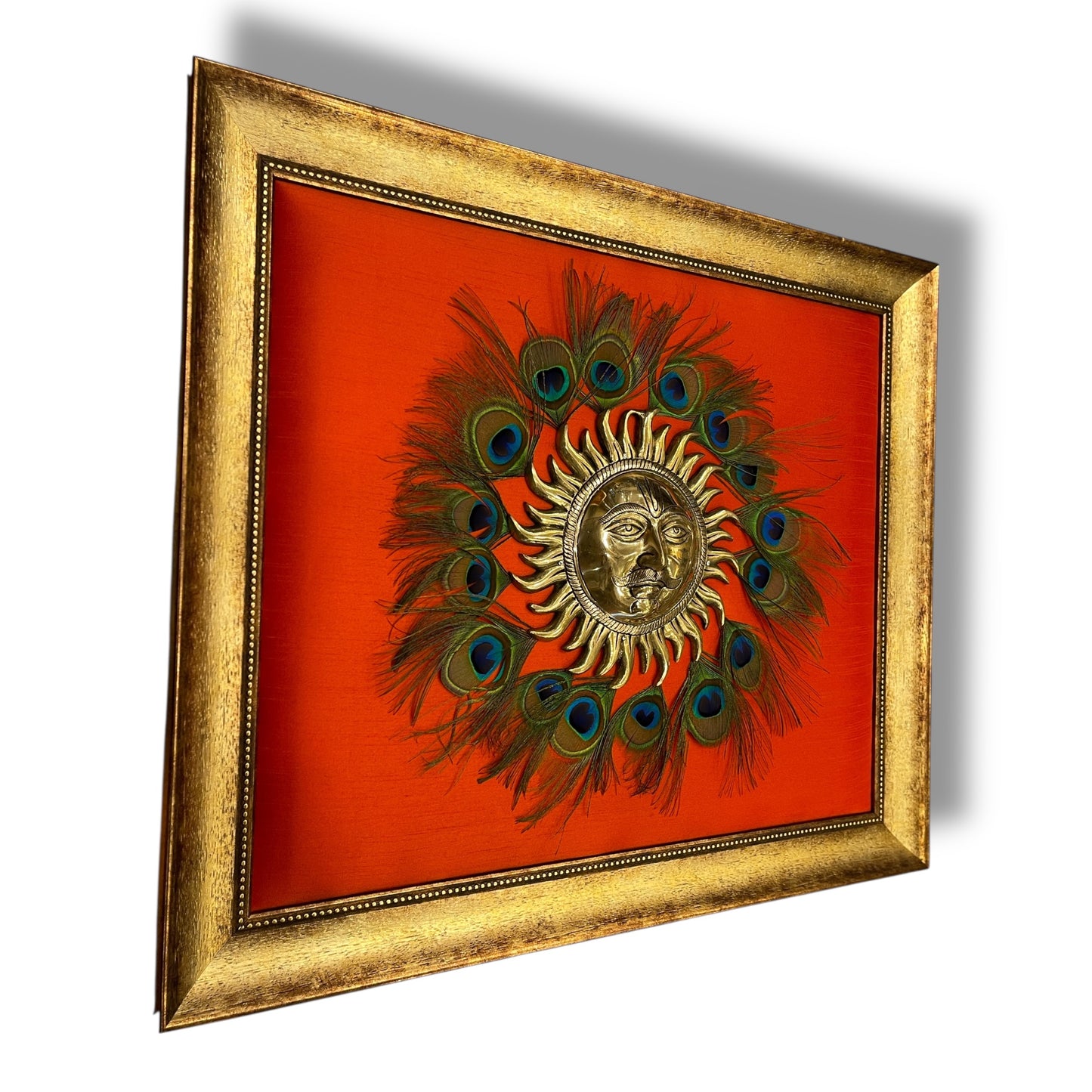 Brass Sun Wall Art with Peacock Feathers in Moulded Frame.