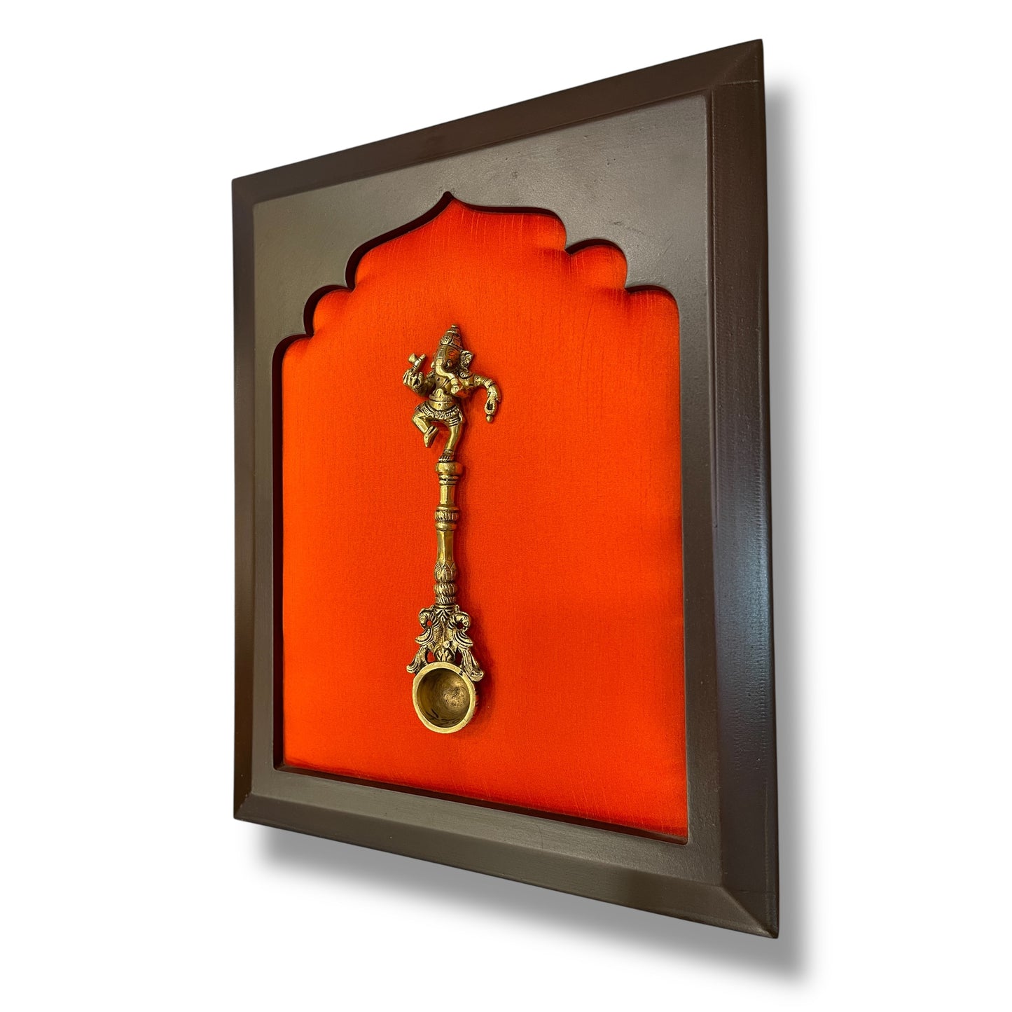 Brass Ganesha Tirtha on Dark Orange in Wooden Frame – Spiritual Wall Décor