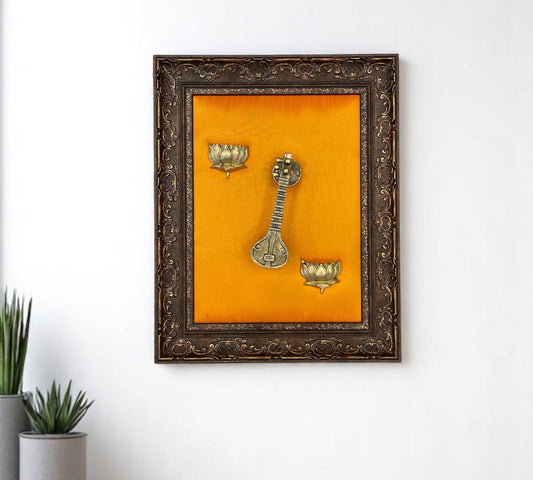 Veena & Lotus Brass with Golden Silk In Moulded Frame