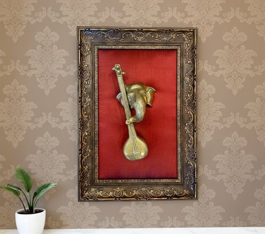 Vidya Ganapathi Brass with wine red silk in Moulded frame