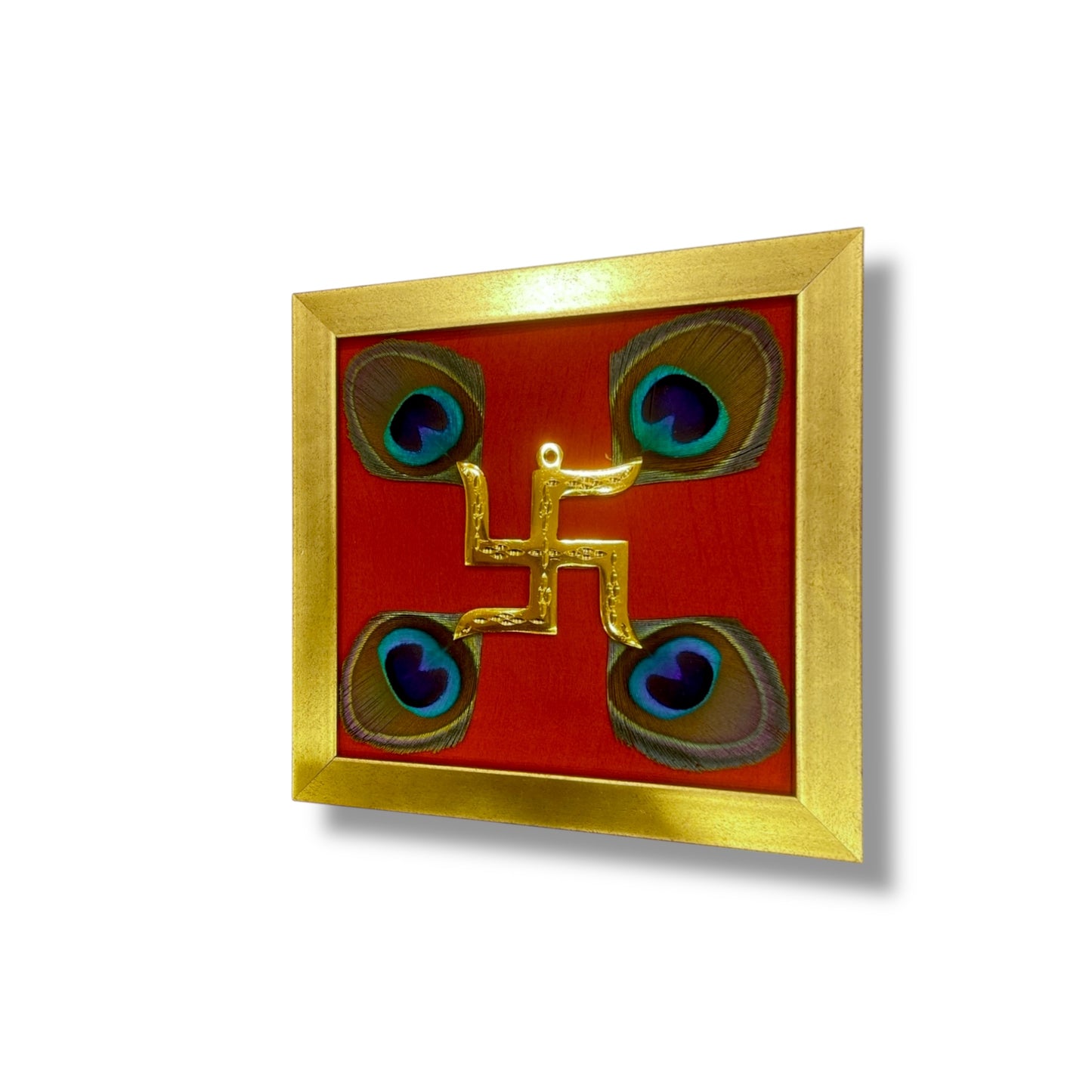 Brass Swastik With Peacock Feathers with Red silk in Gold frame