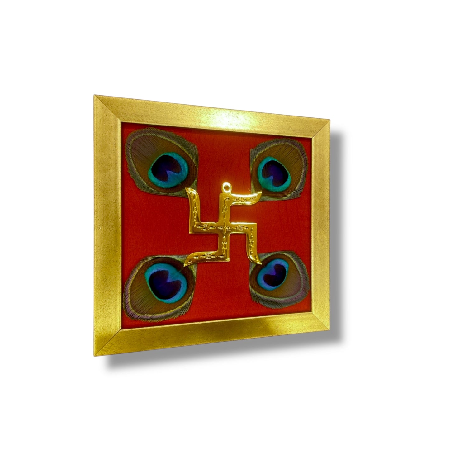 Brass Swastik With Peacock Feathers with Red silk in Gold frame