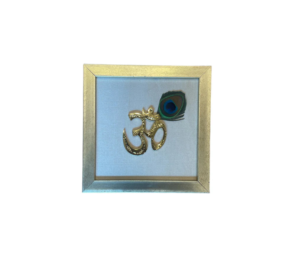 Brass Om with peacock feather & wine red silk in Gold frame