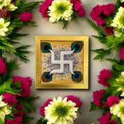 White Wooden Swastik with Peacock Feathers on Omkara in Gold Frame