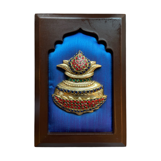 Brass kuber kalash with stone work on Blue silk in wooden frame