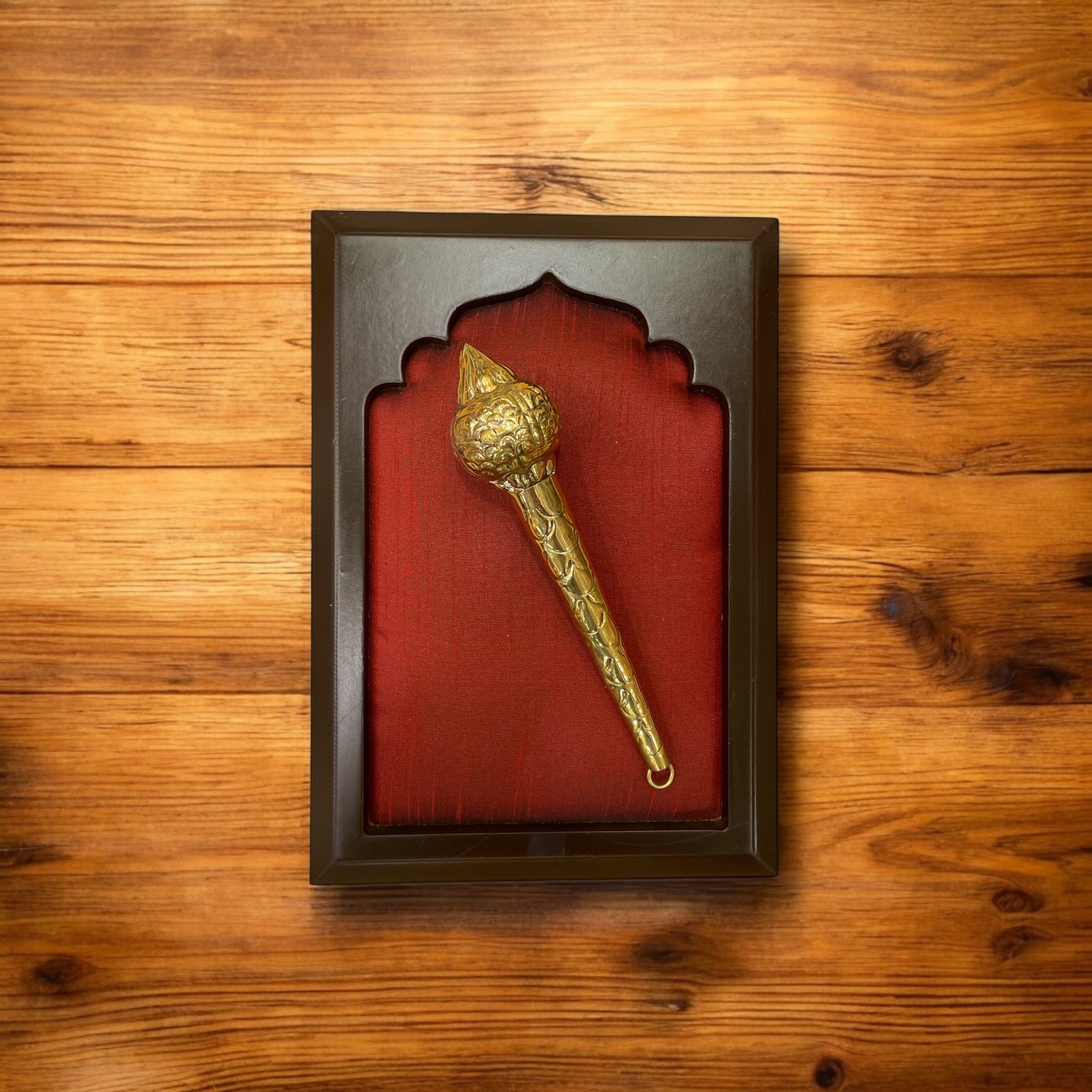 Brass Gadha on Red Silk in Wooden Frame