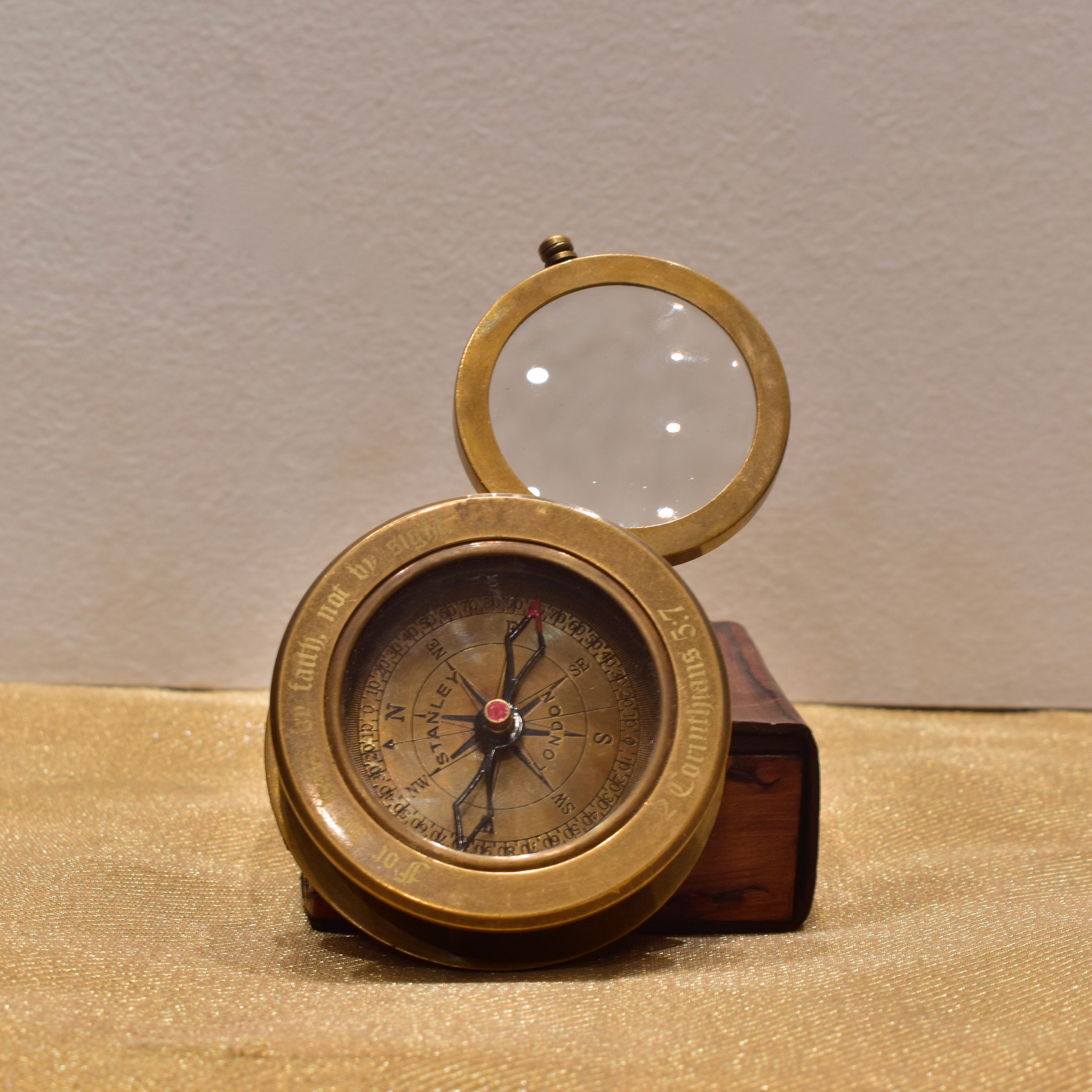 Compass with magnifying glass