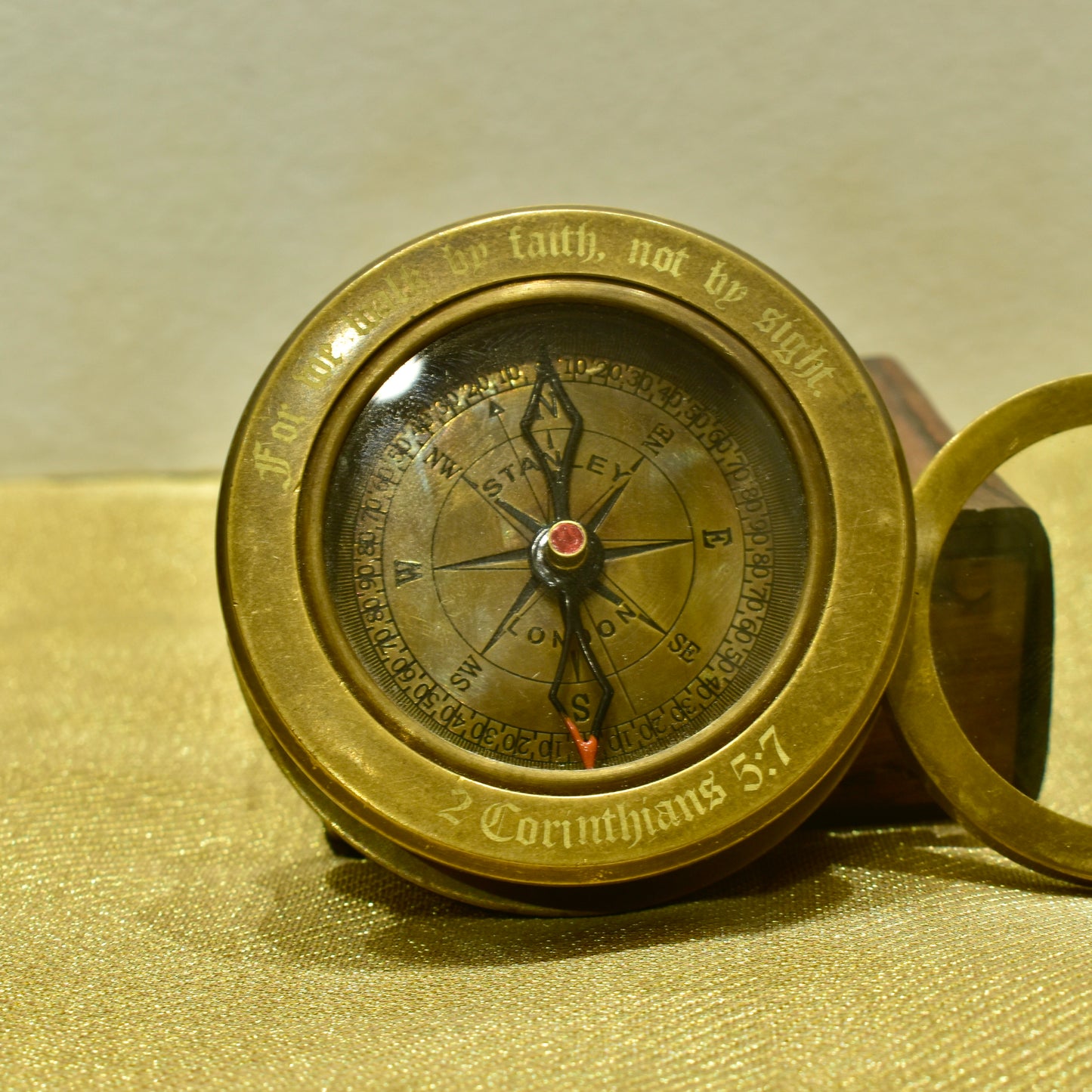 Compass with magnifying glass