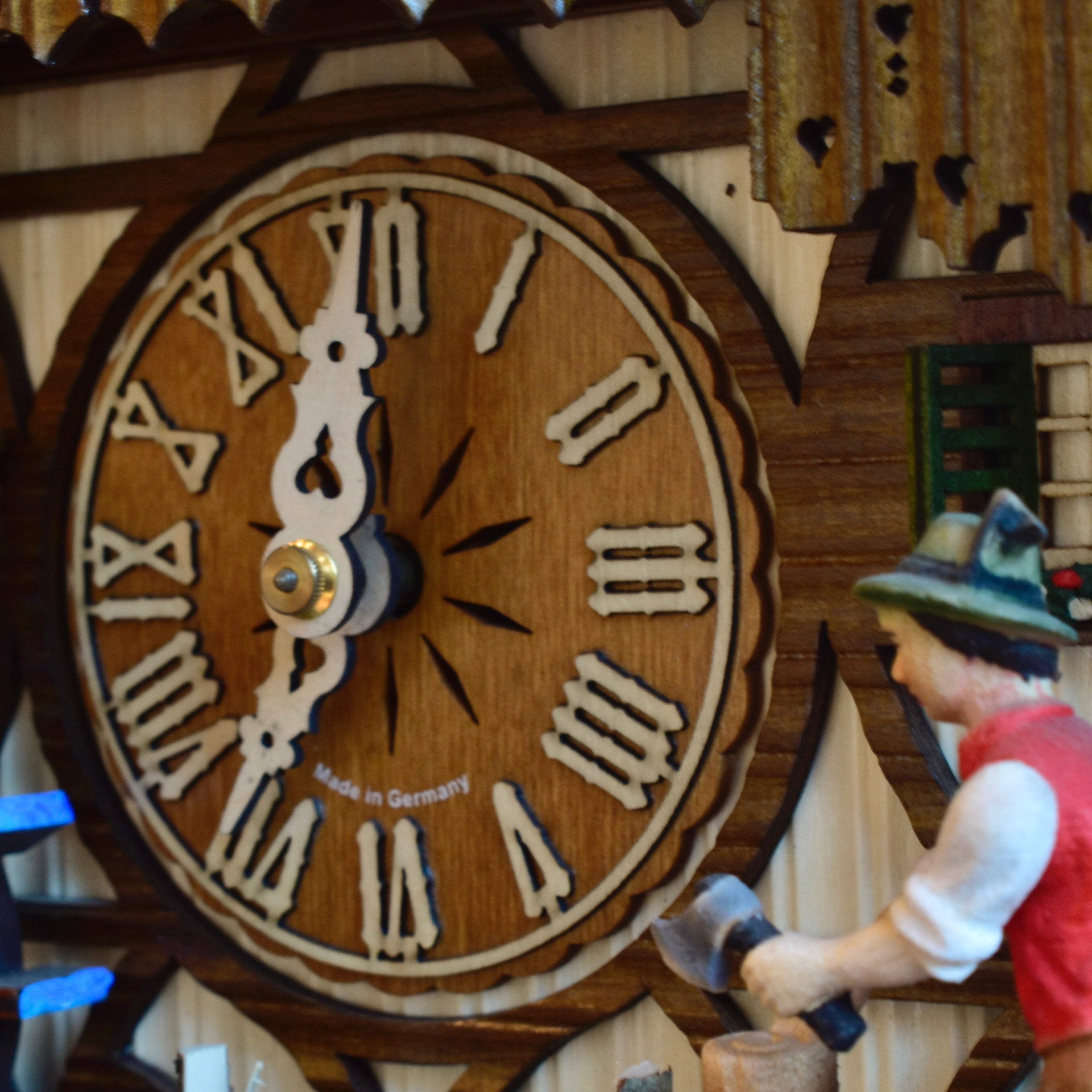 Musical mechanical cuckoo clock - with wood cutter and German farm dance moving parts - 8 day movement