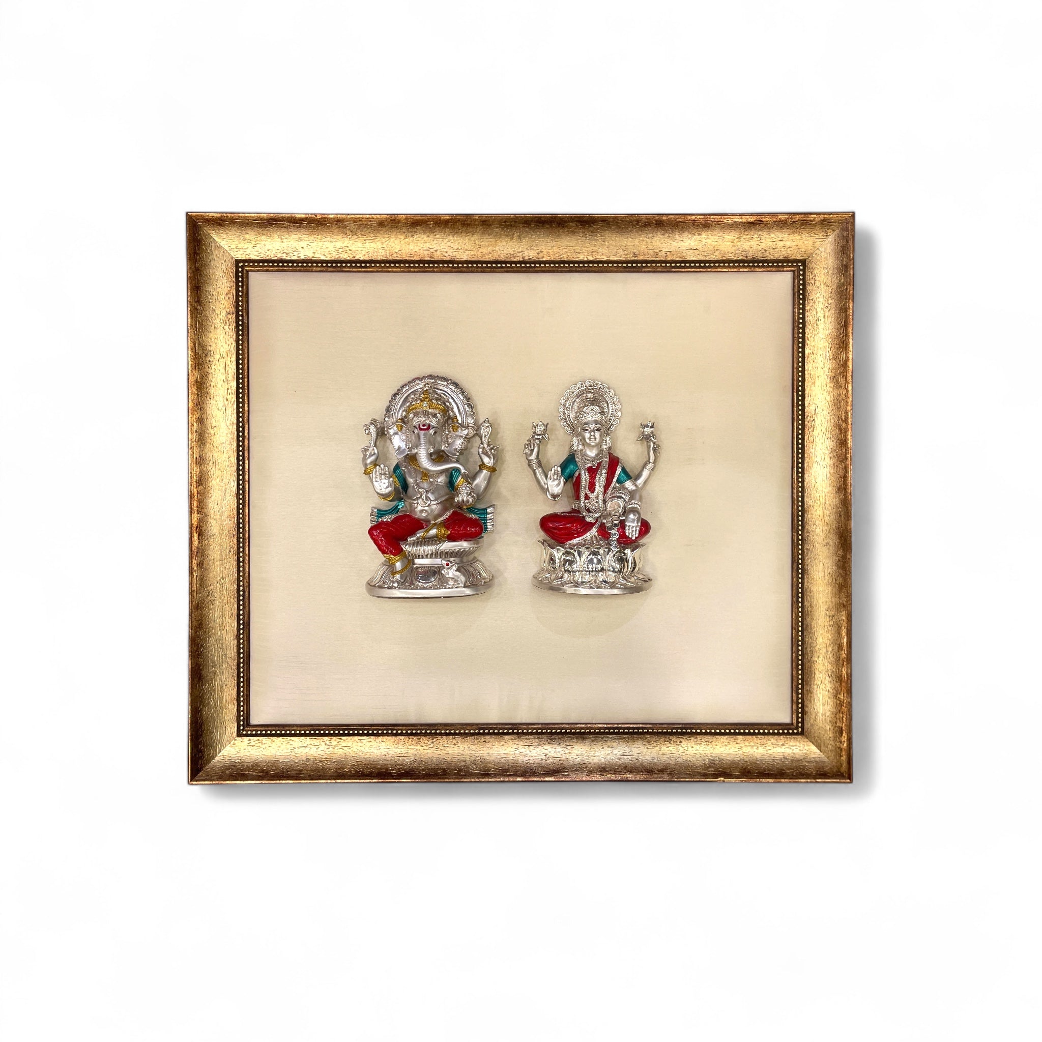 Ganesh Laxmi Silver on White Silk Backdrop in Antique Gold Moulded Frame