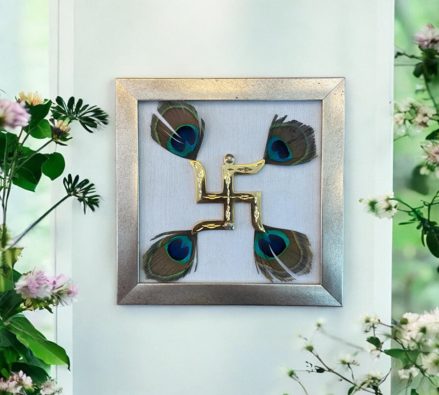 Brass Swastik with Peacock Feather and White silk in antique gold Frame