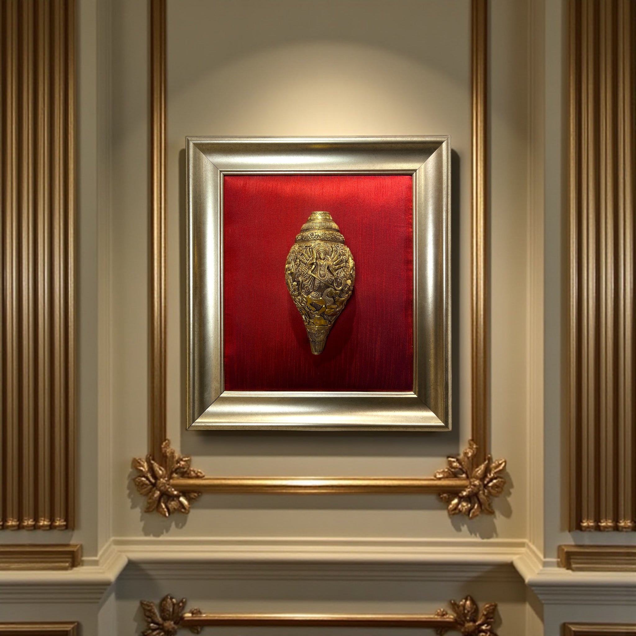 Maa Tripura Sundari Shankh with Ganesh and Kartikeya, set in an antique god frame with a wine-red silk backdrop, brass