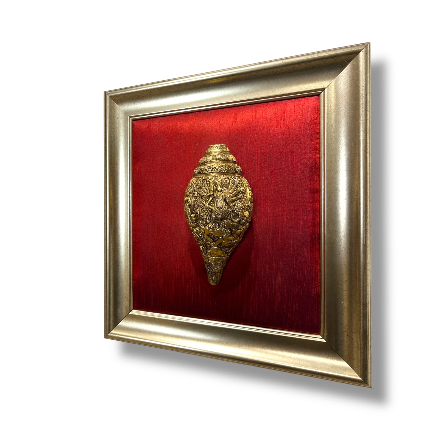 Maa Tripura Sundari Shankh with Ganesh and Kartikeya, set in an antique god frame with a wine-red silk backdrop, brass