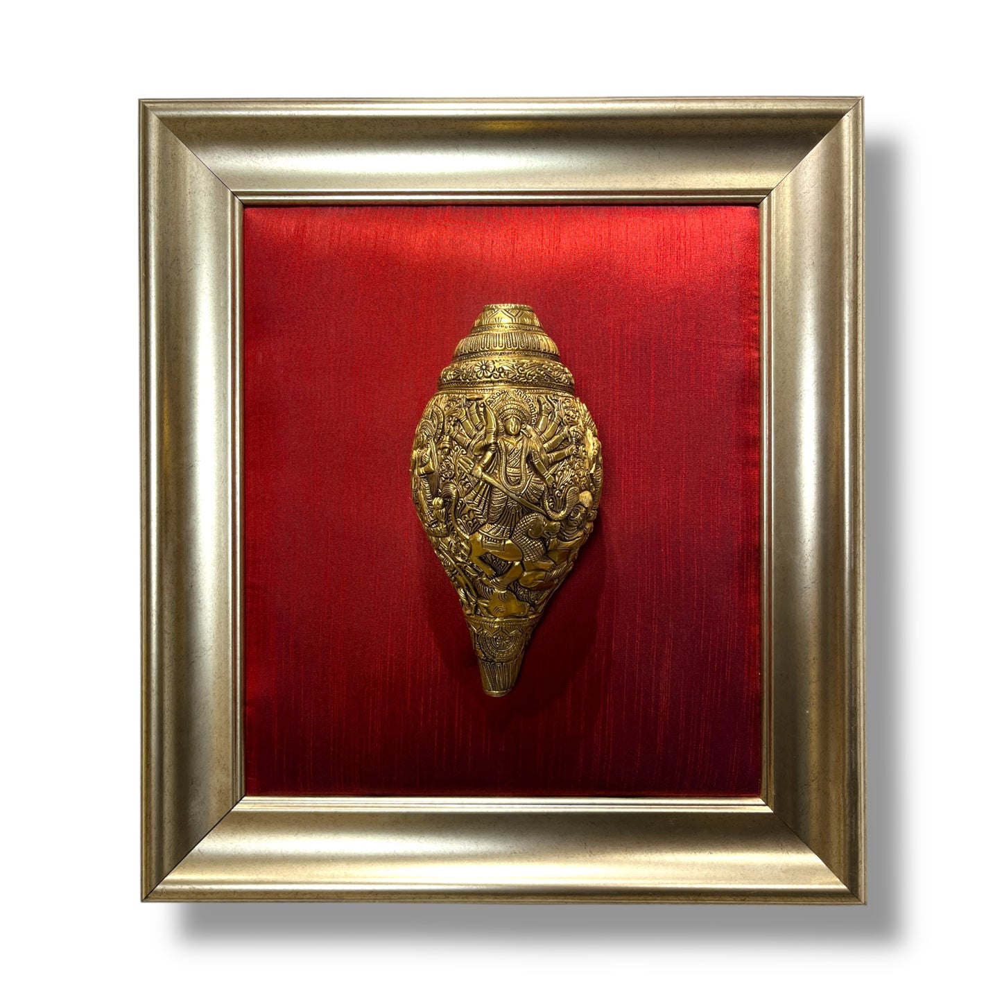 Maa Tripura Sundari Shankh with Ganesh and Kartikeya, set in an antique god frame with a wine-red silk backdrop, brass