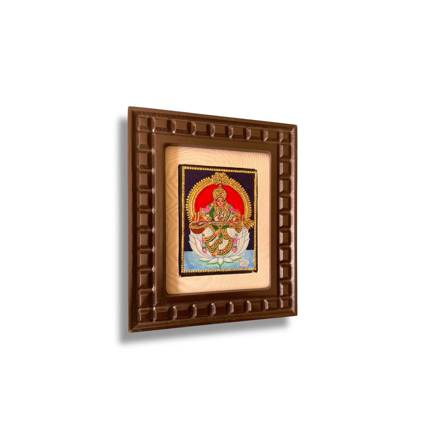 Goddess Saraswati on White Lotus Tanjore Painting – Red, Indigo Blue, Rama Green, White & Orange