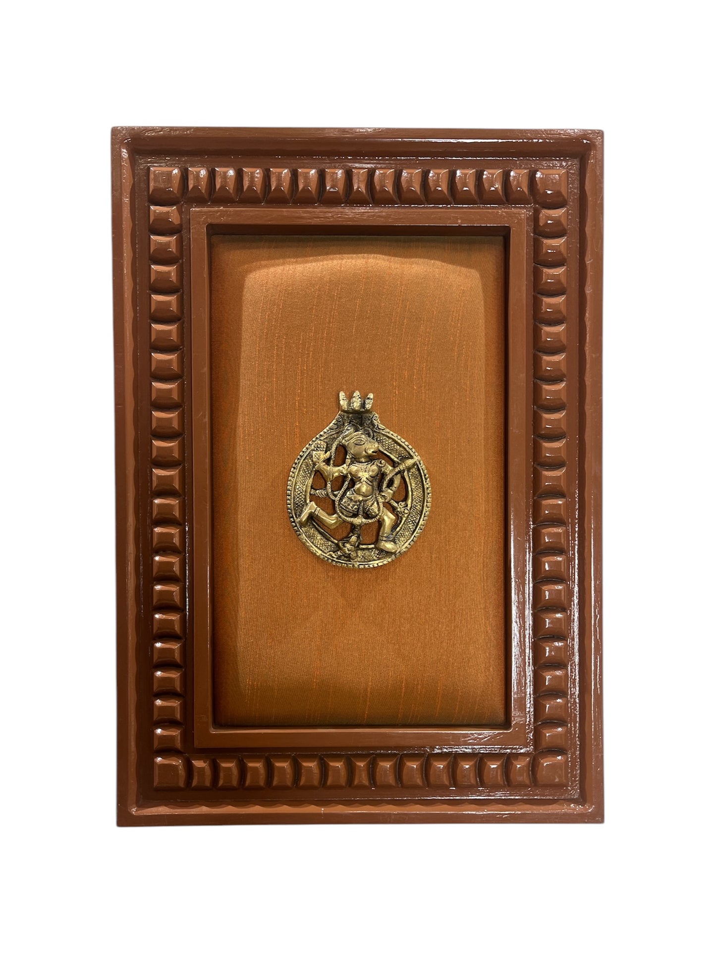 Brass Hanuman with orange silk backdrop in wooden frame