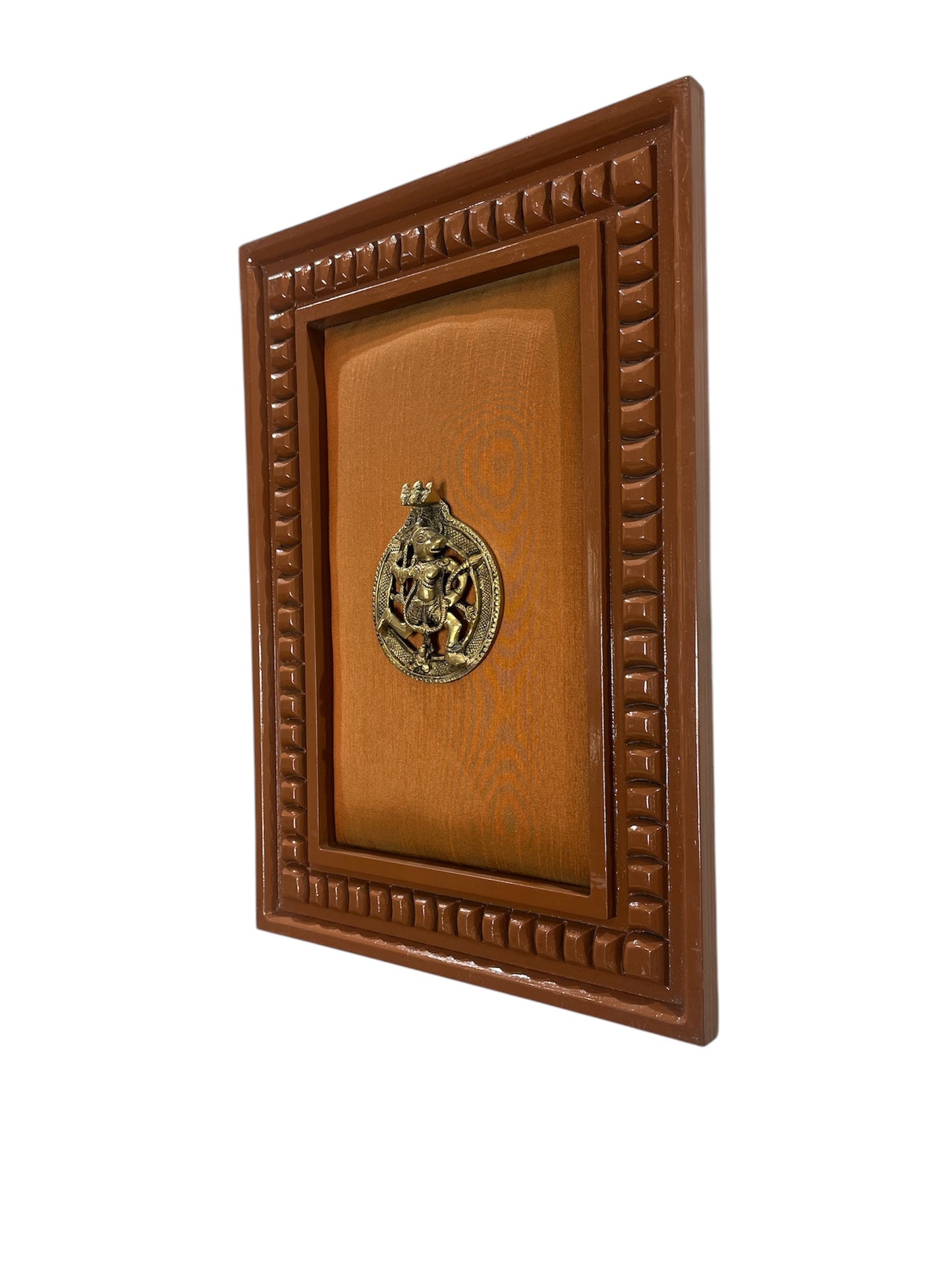 Brass Hanuman with orange silk backdrop in wooden frame