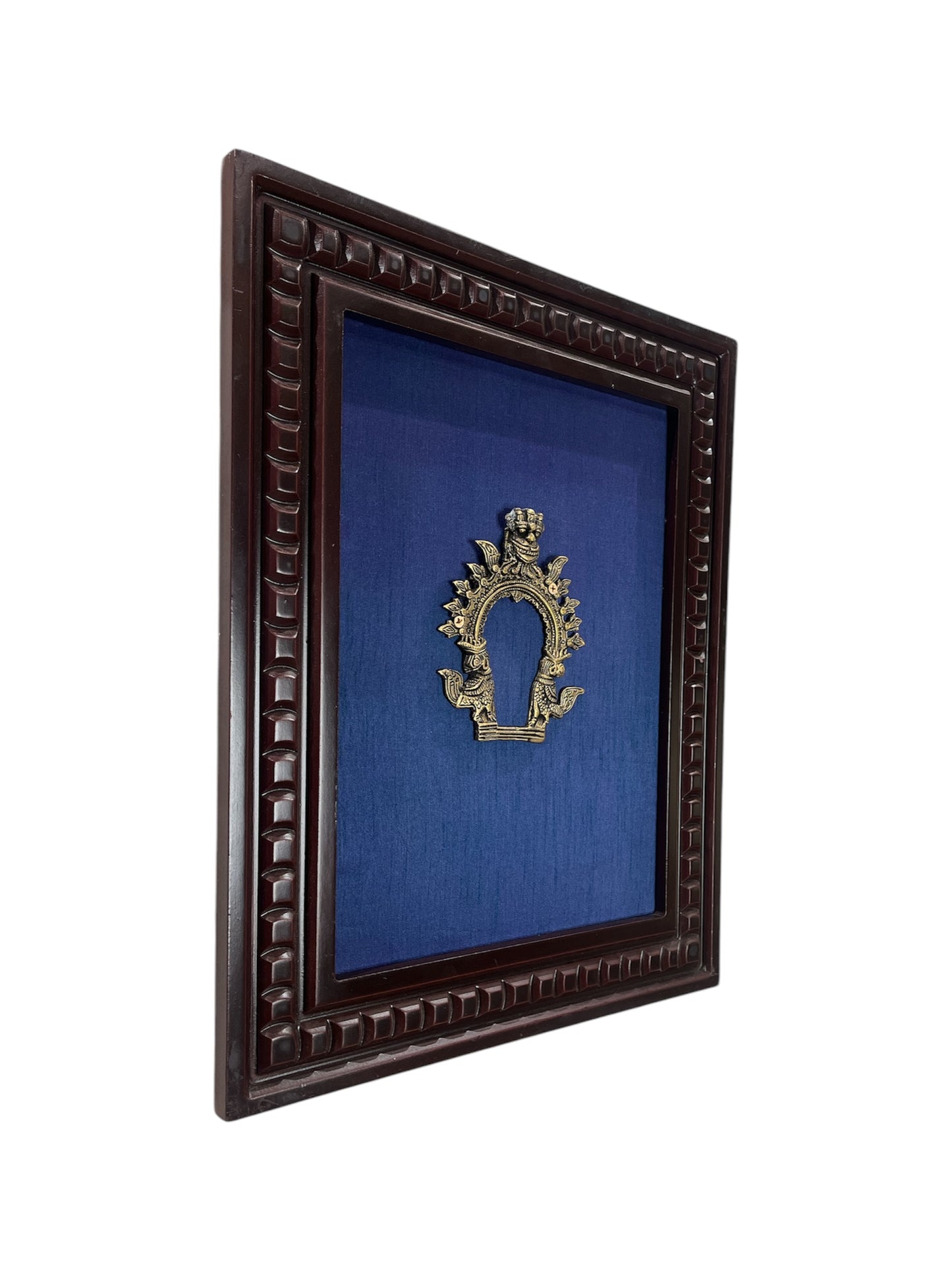 Brass Prabhavali with blue silk backdrop in wooden frame