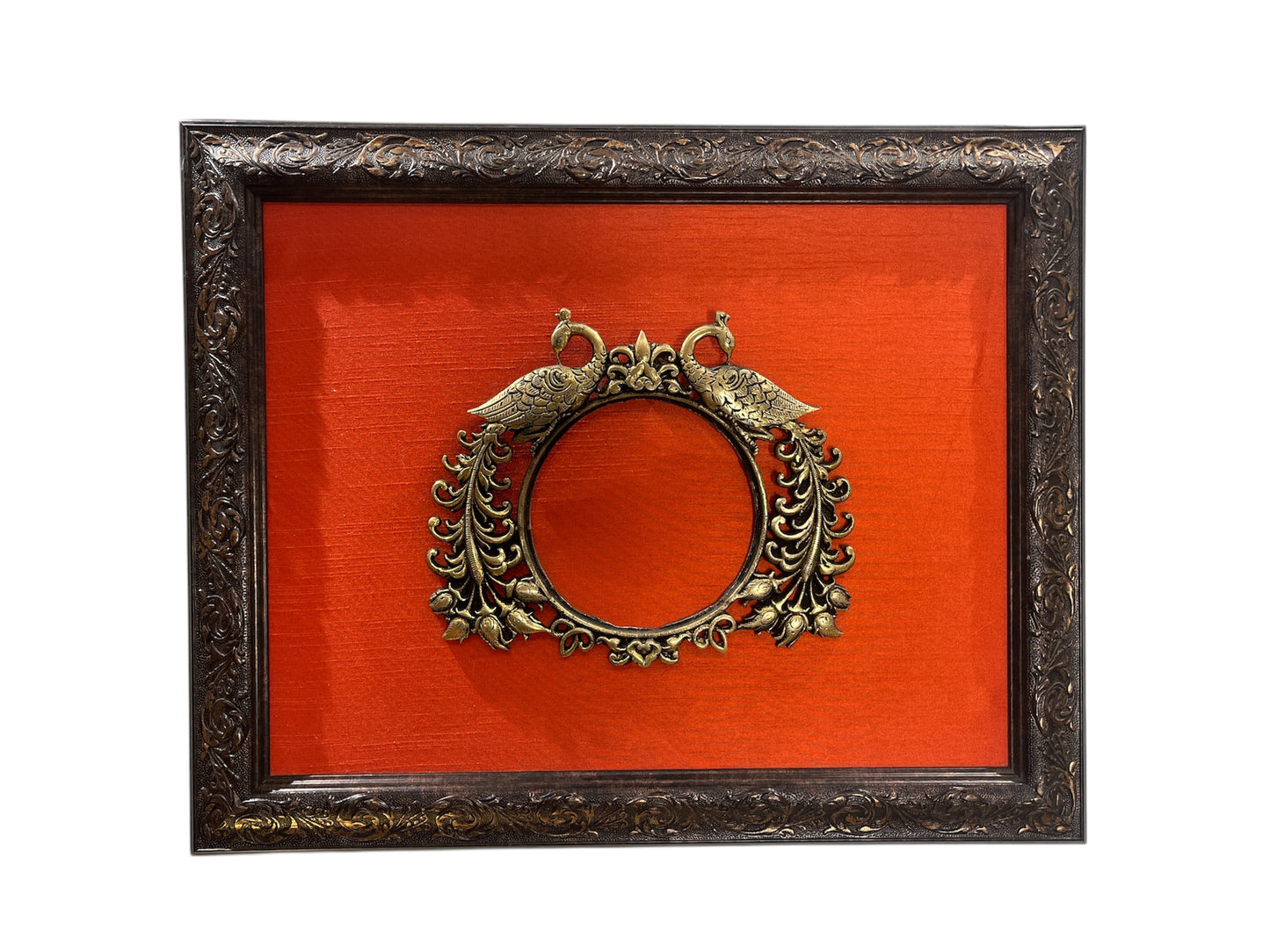 Brass Paired Peacock with orange silk backdrop in moulded frame