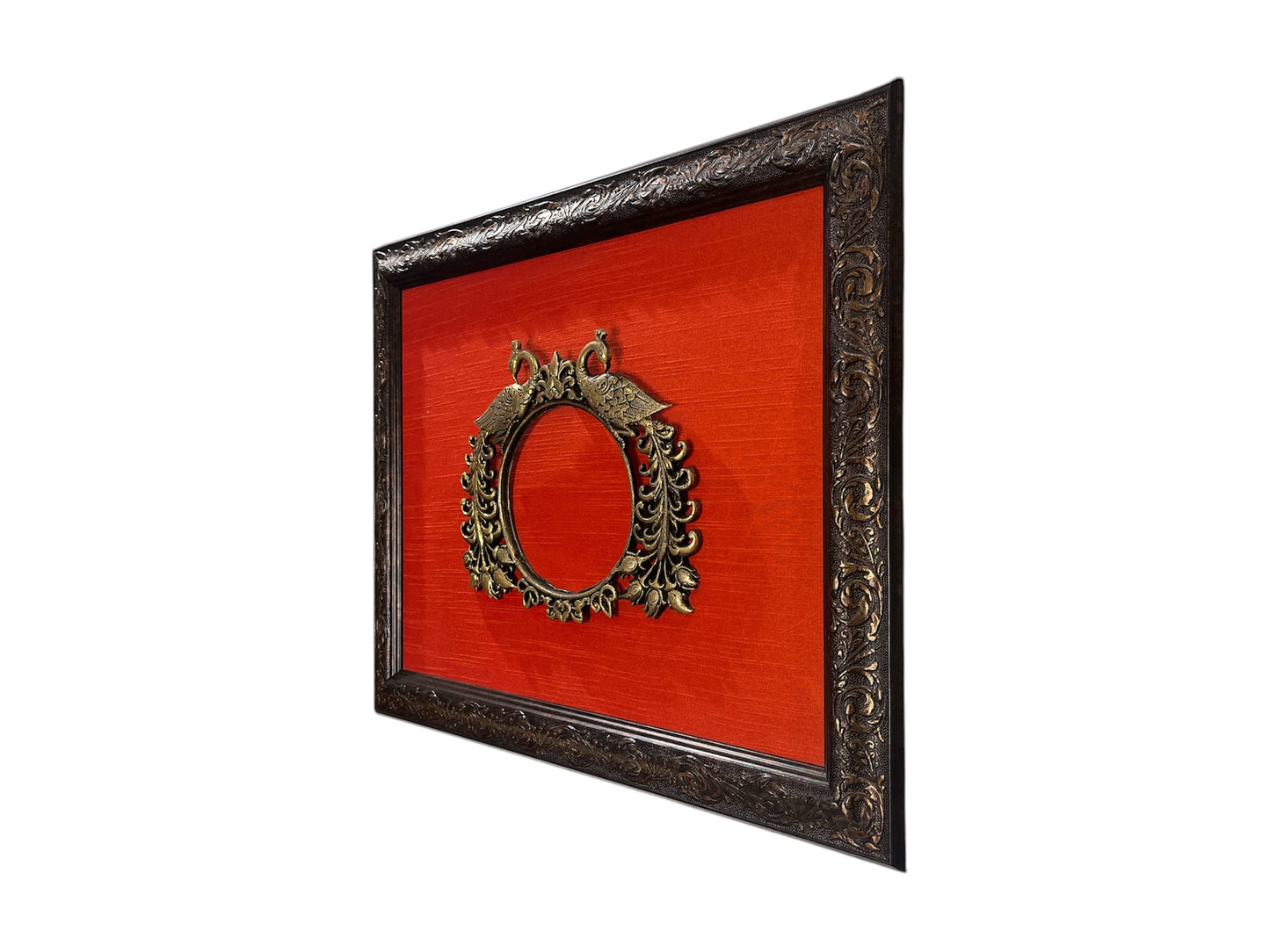 Brass Paired Peacock with orange silk backdrop in moulded frame