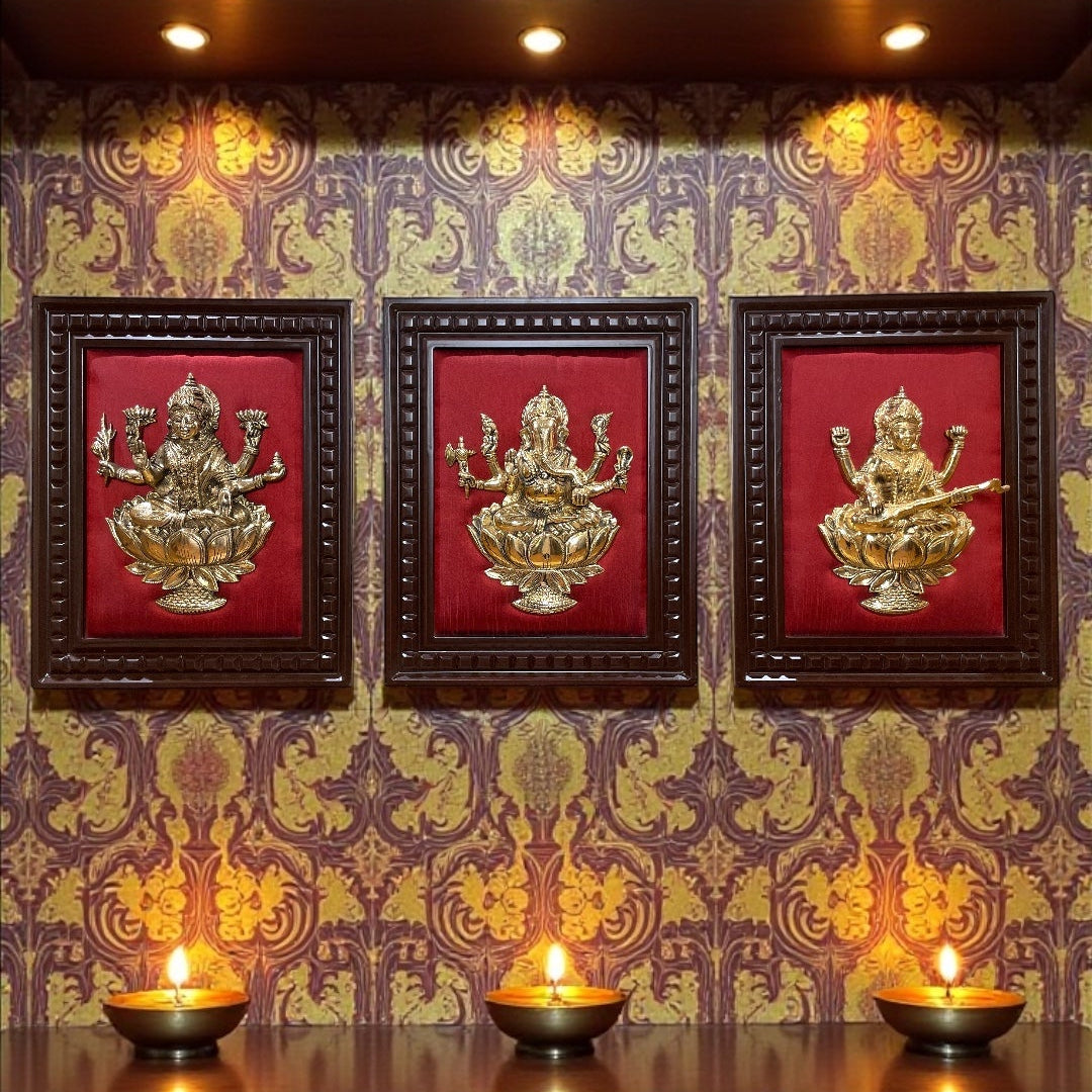 Brass Ganesha,Lakshmi,Saraswati Wall Art with Rich Red Silk Backdrop
