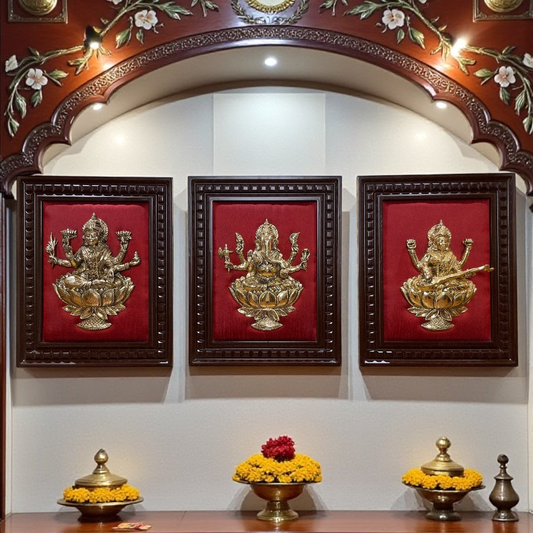 Brass Ganesha,Lakshmi,Saraswati Wall Art with Rich Red Silk Backdrop