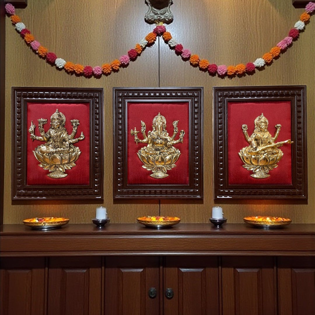 Brass Ganesha,Lakshmi,Saraswati Wall Art with Rich Red Silk Backdrop