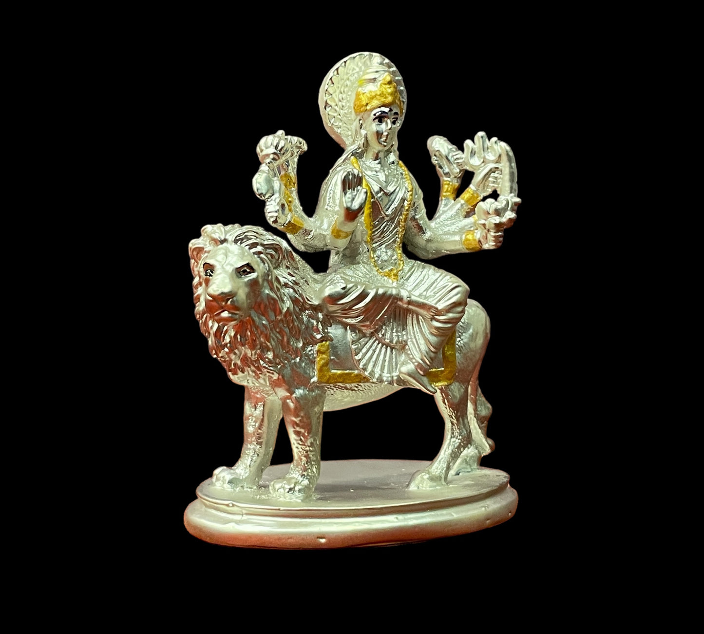 Silver Durga Matha idol seated on a lion