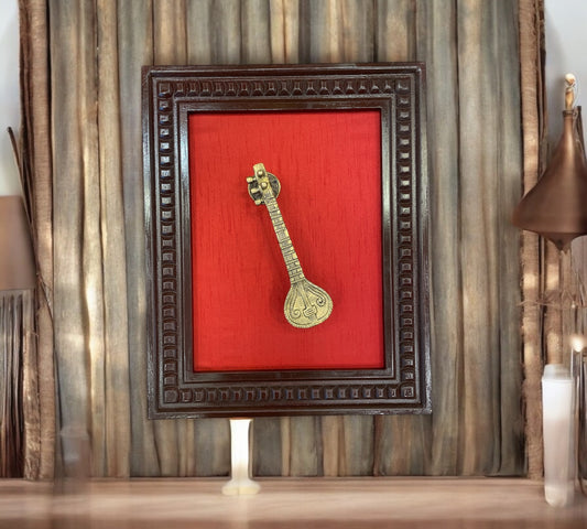 Sitar Brass With Wine red Backdrop Within Wooden frame