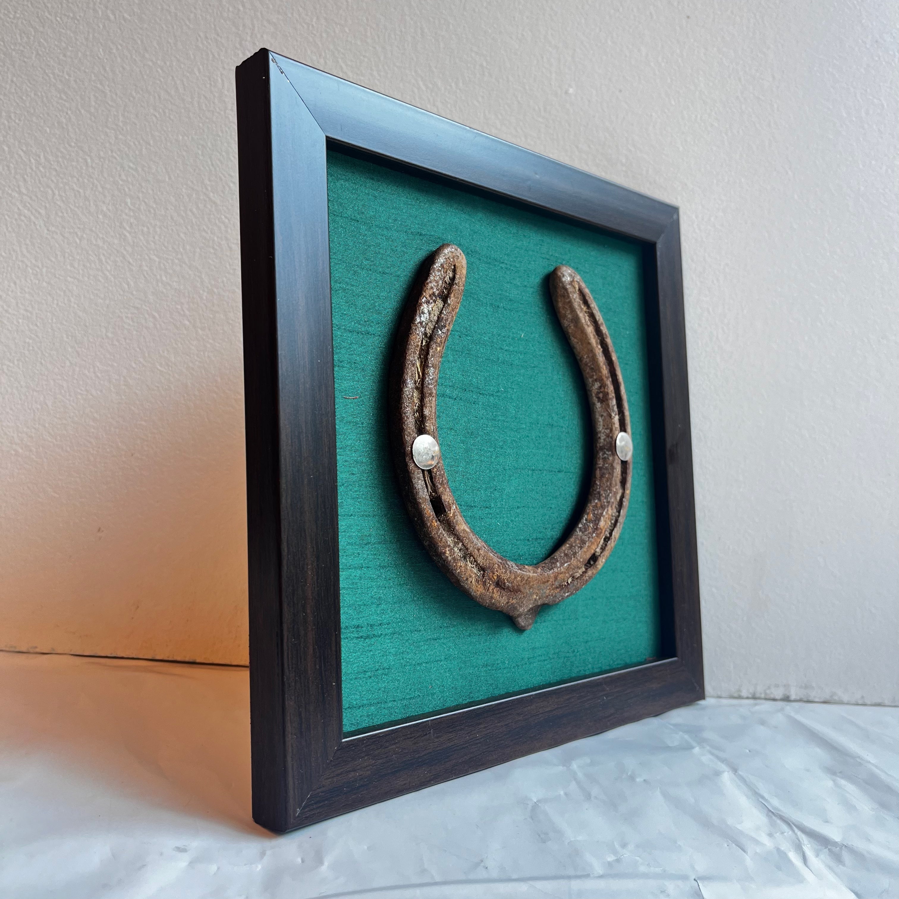 Good Luck Rustic Horse Shoe with Rama Green silk background in Brown frame