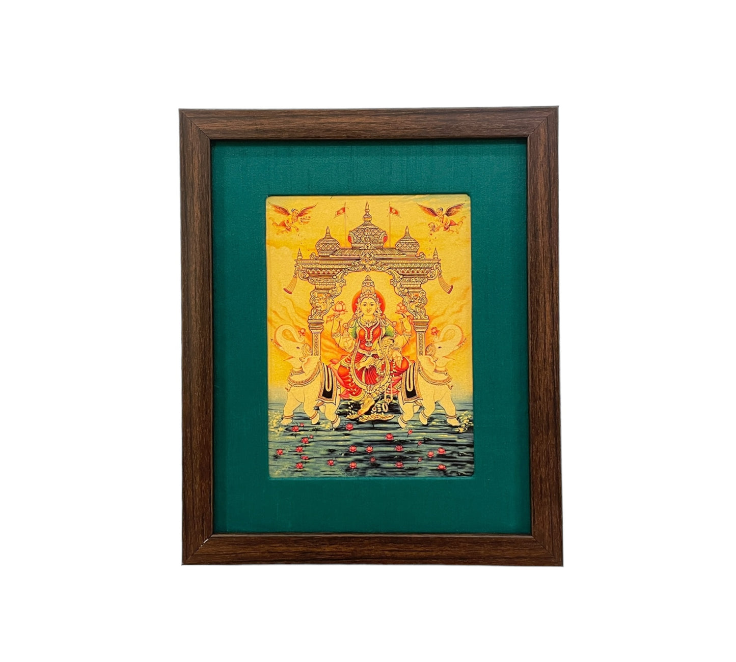 Verdant Blessings: Gajalakshmi Devi's Divine Presence in Green Silk With Brown Frame