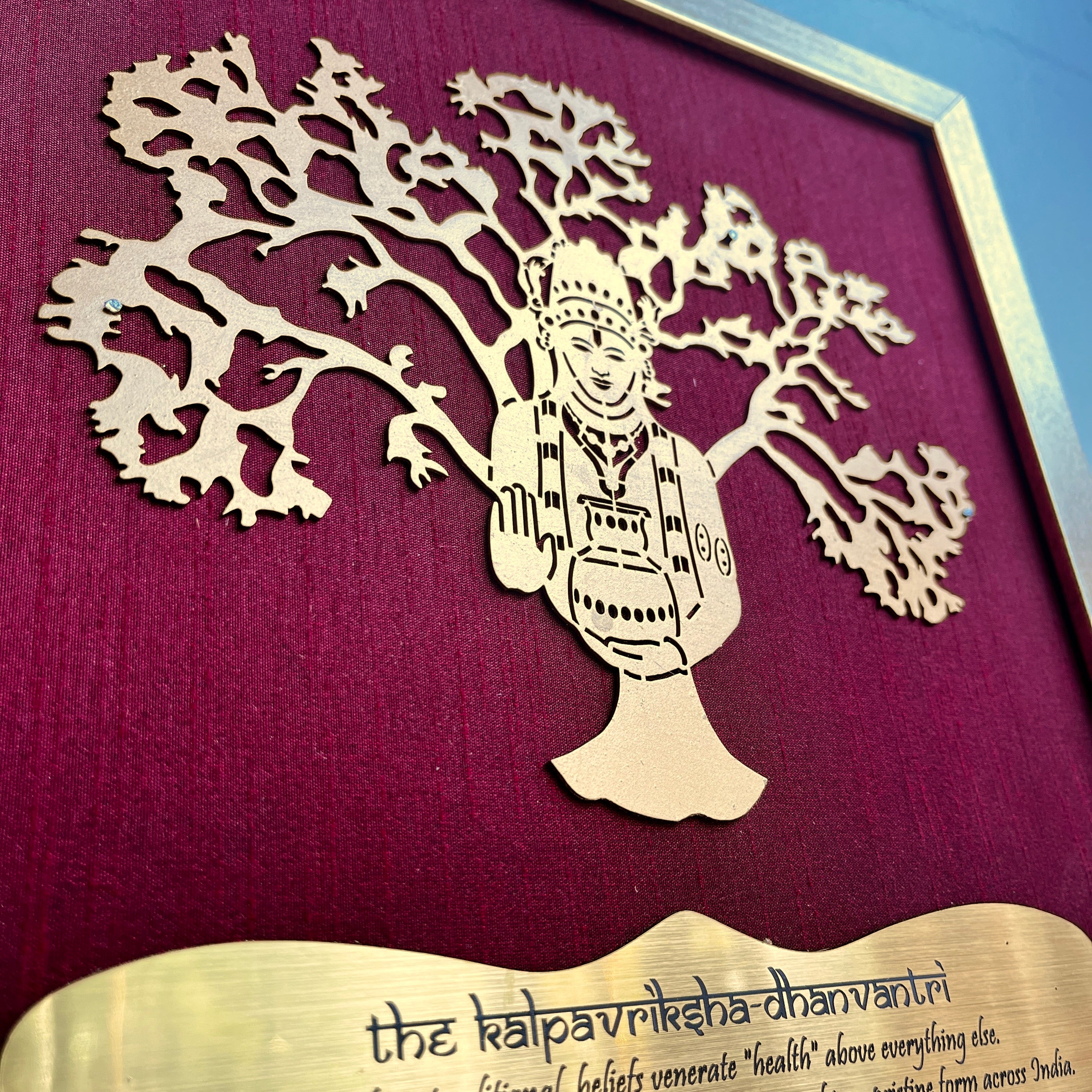 Dhanvantri with Wine red silk background