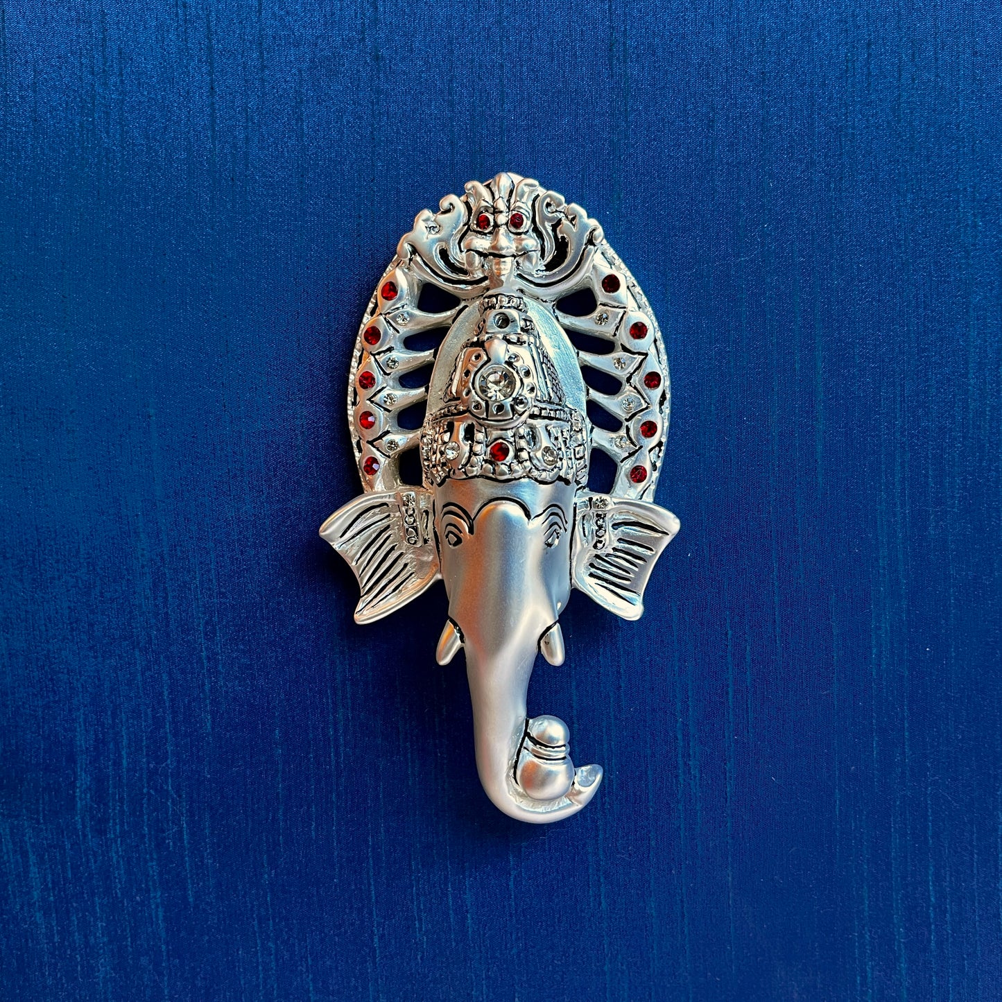 Sacred Ratna Kalash Ganesha on Blue Silk With Silver Frame