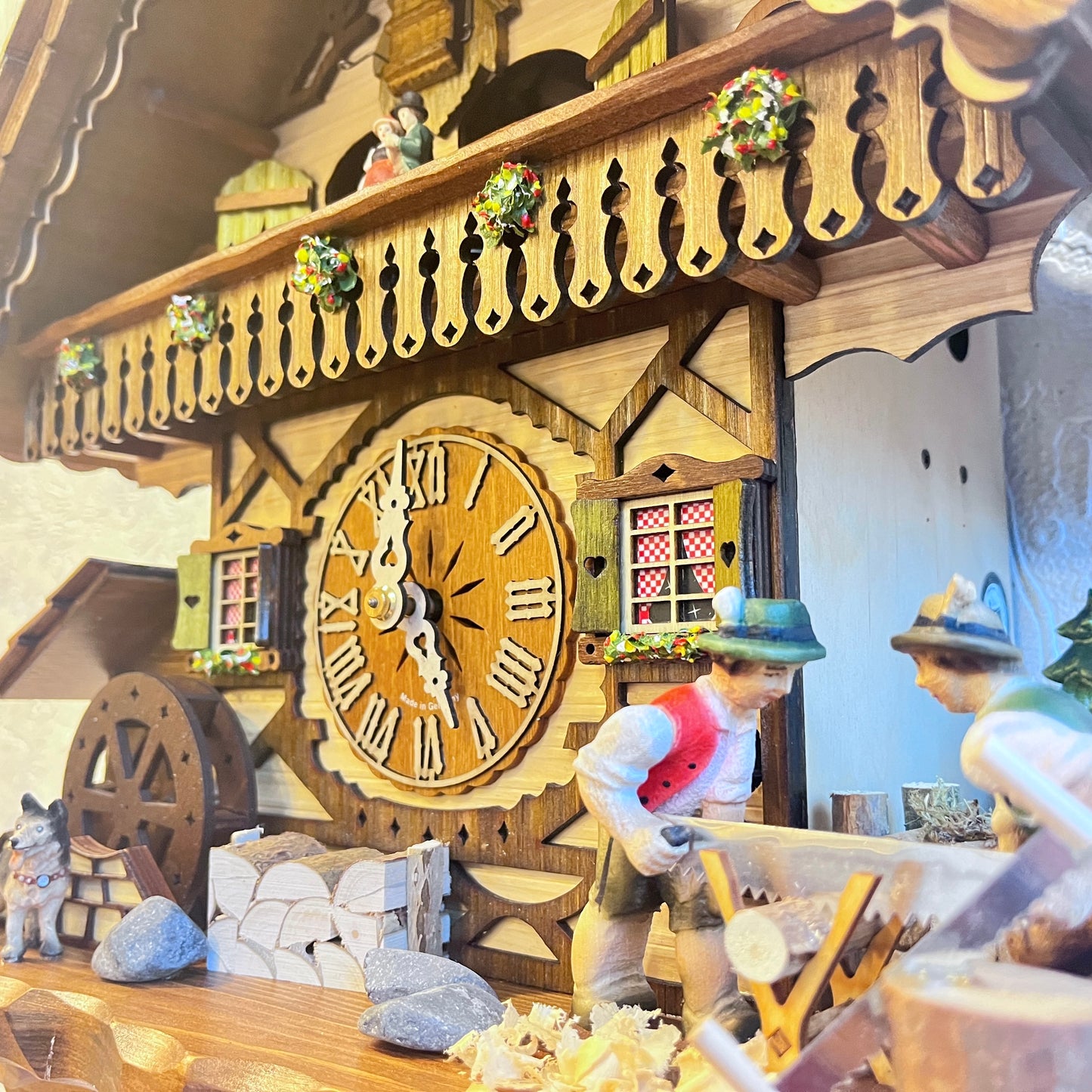 Musical German Cuckoo Clock With Sawing Men And Water Wheel