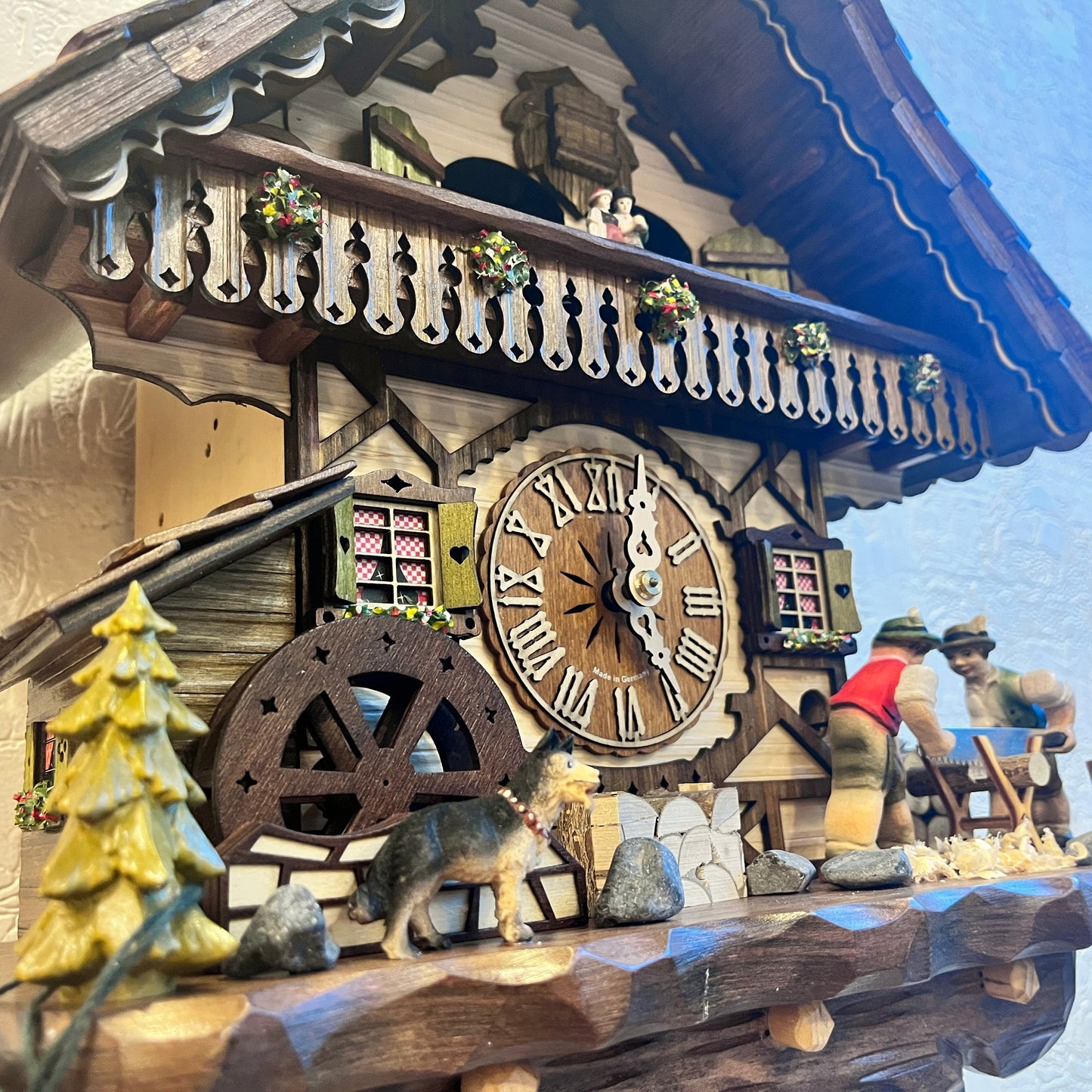 Musical German Cuckoo Clock With Sawing Men And Water Wheel