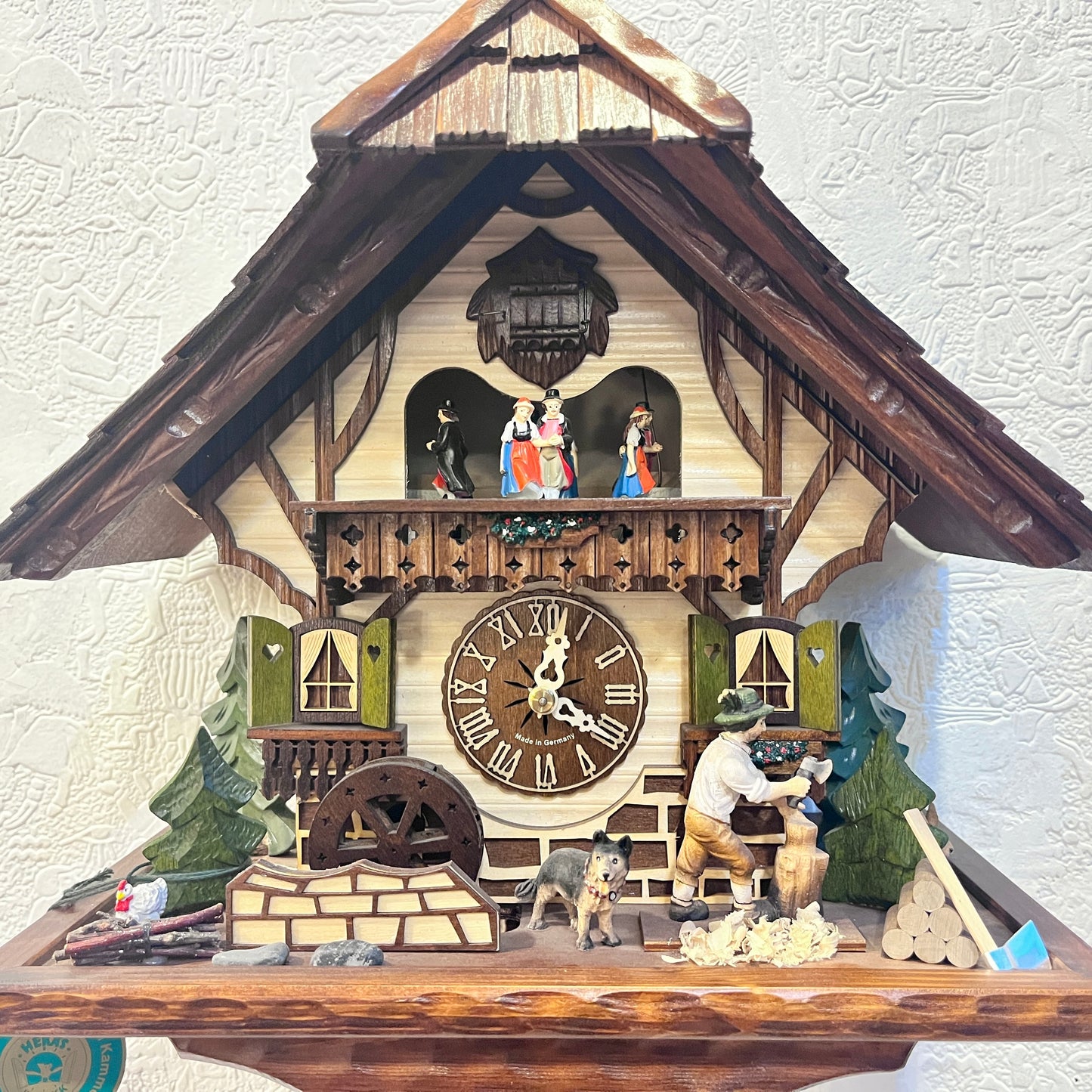 Musical cuckoo clock with wood cutter, water wheel & German farm dance - one day mechanical Movement